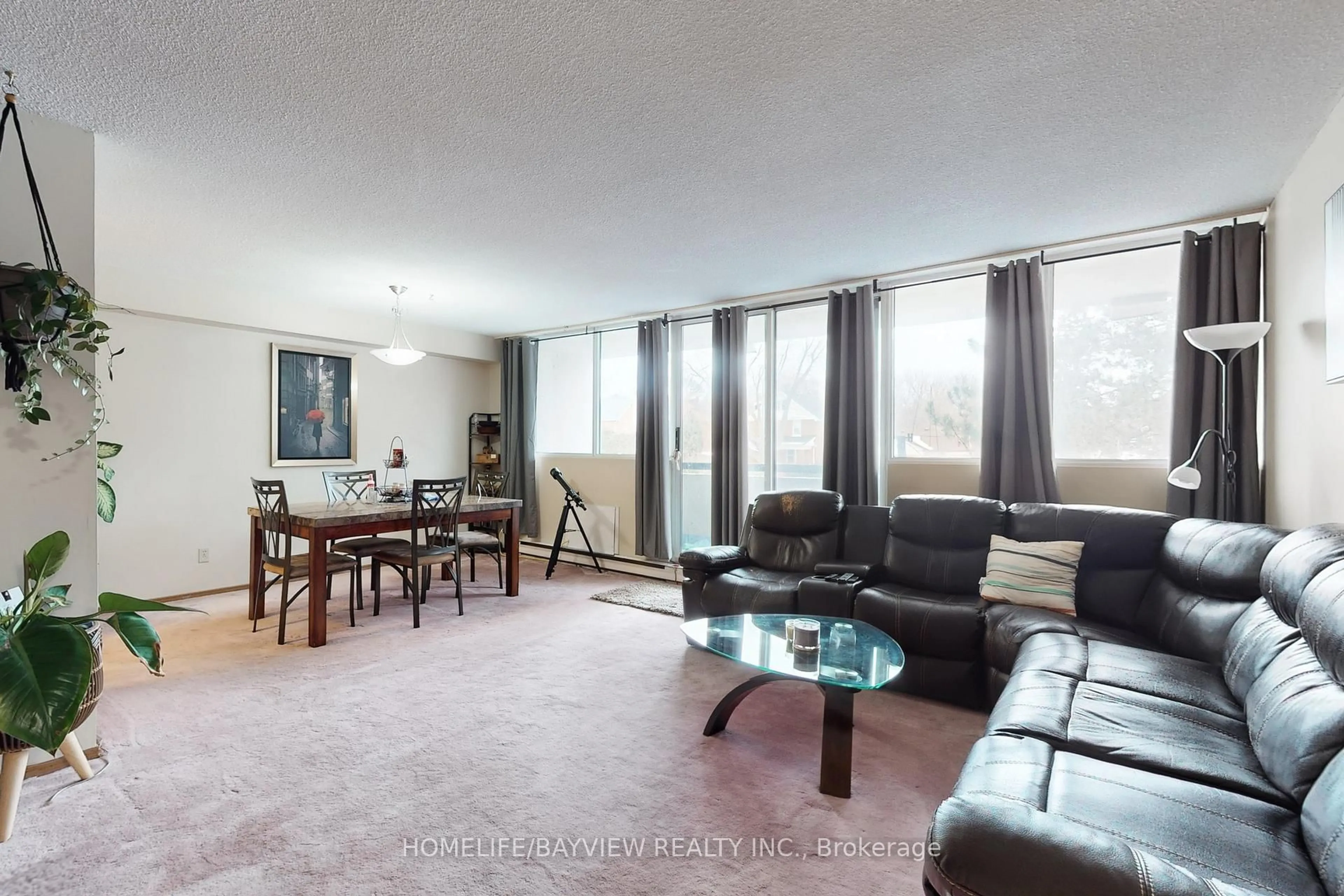 Living room with furniture, unknown for 120 Elgin St #207, Oshawa Ontario L1G 1Y6