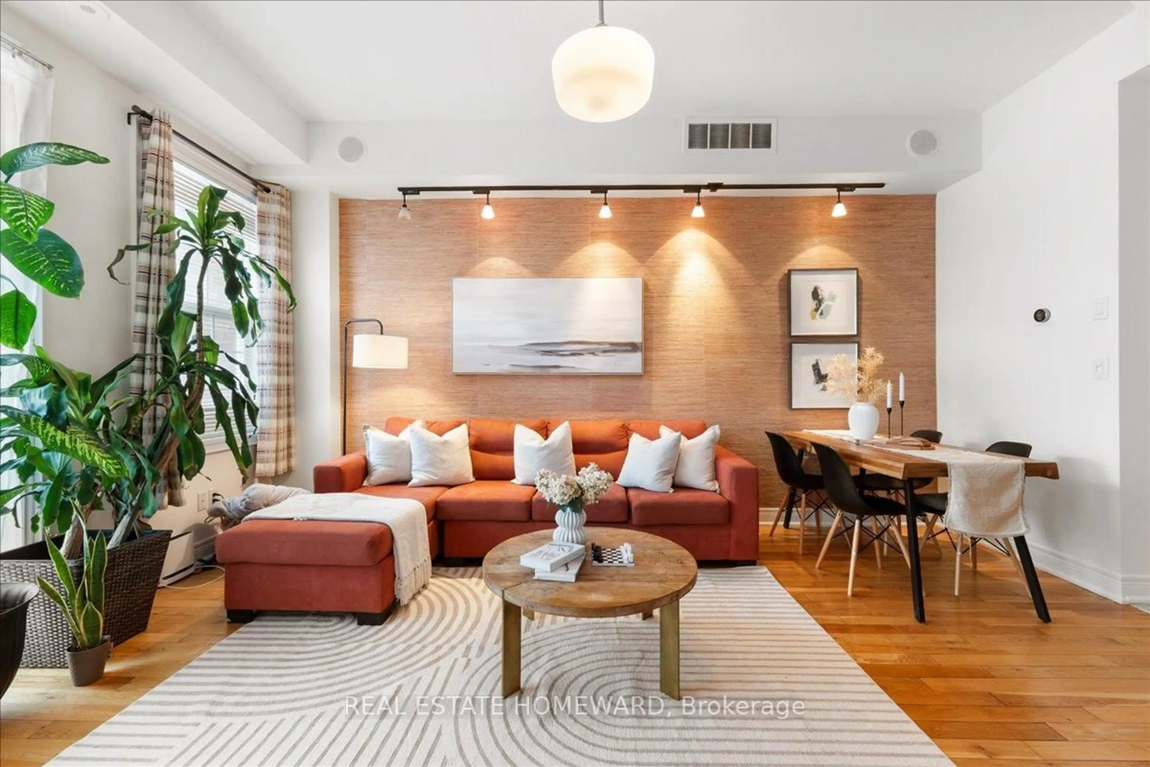 Living room with furniture, unknown for 14 Fairhead Mews, Toronto Ontario M4E 3Y4