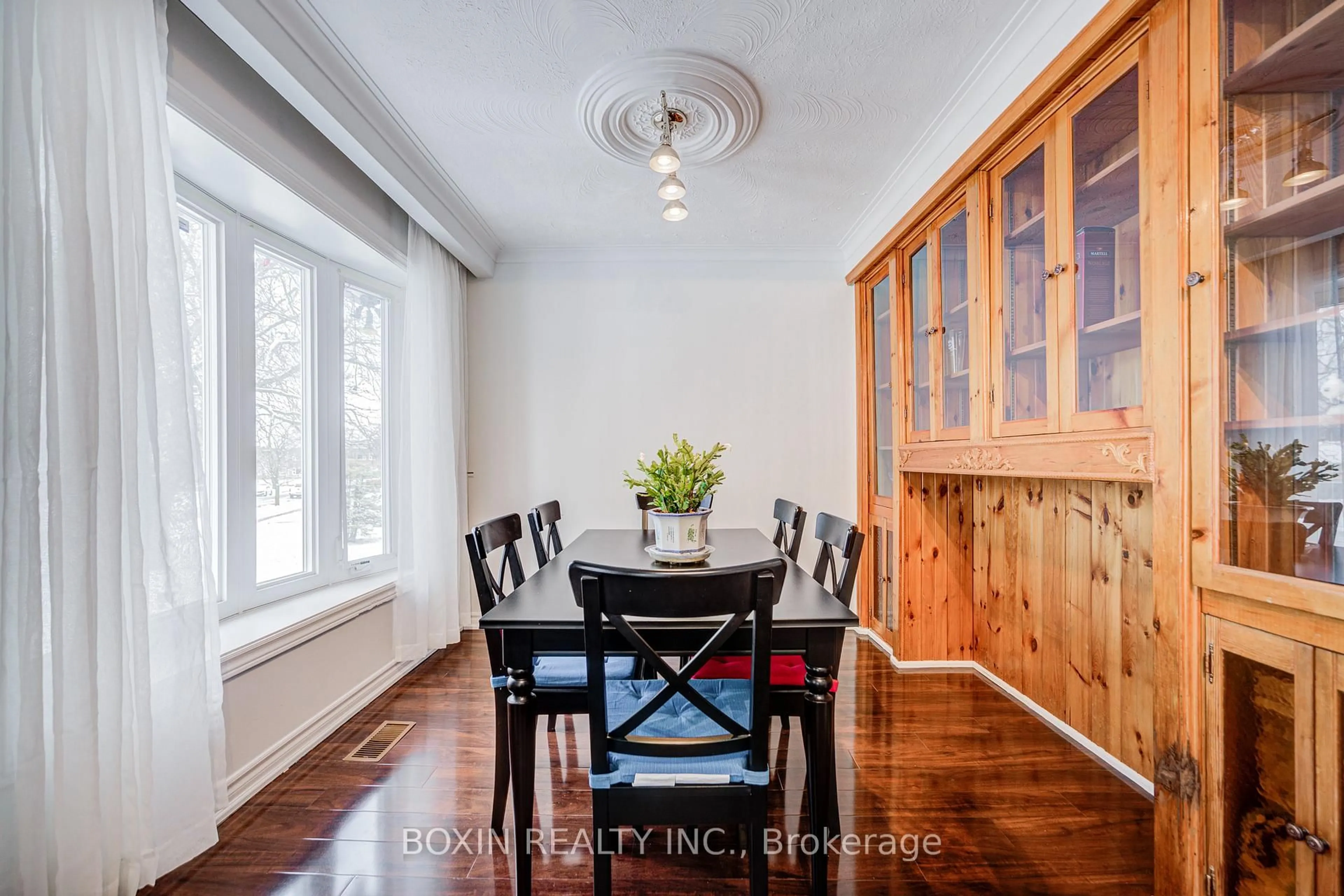Dining room, wood/laminate floor for 31 Tremely Cres, Toronto Ontario M1K 3Y8