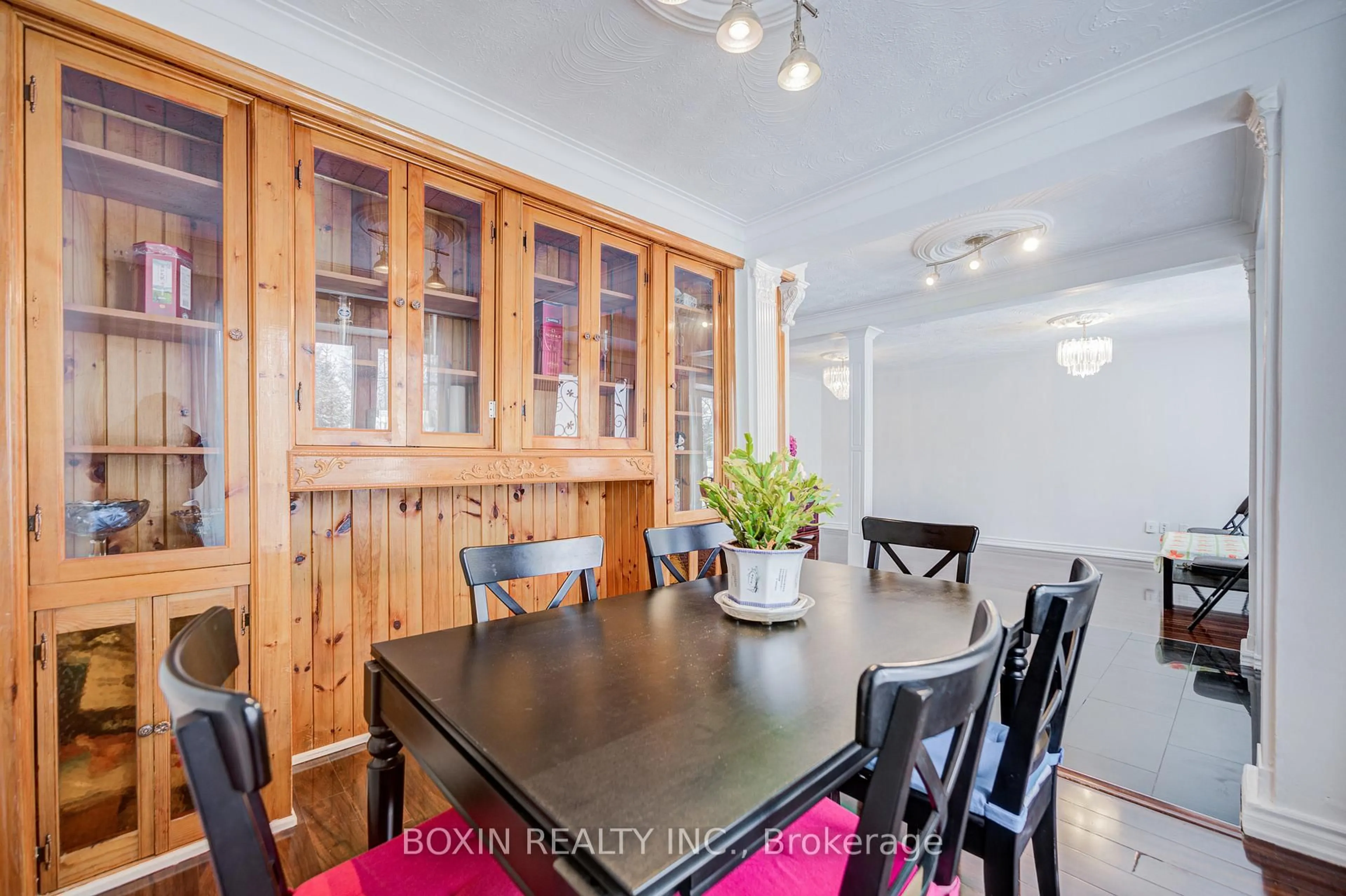 Dining room, wood/laminate floor for 31 Tremely Cres, Toronto Ontario M1K 3Y8