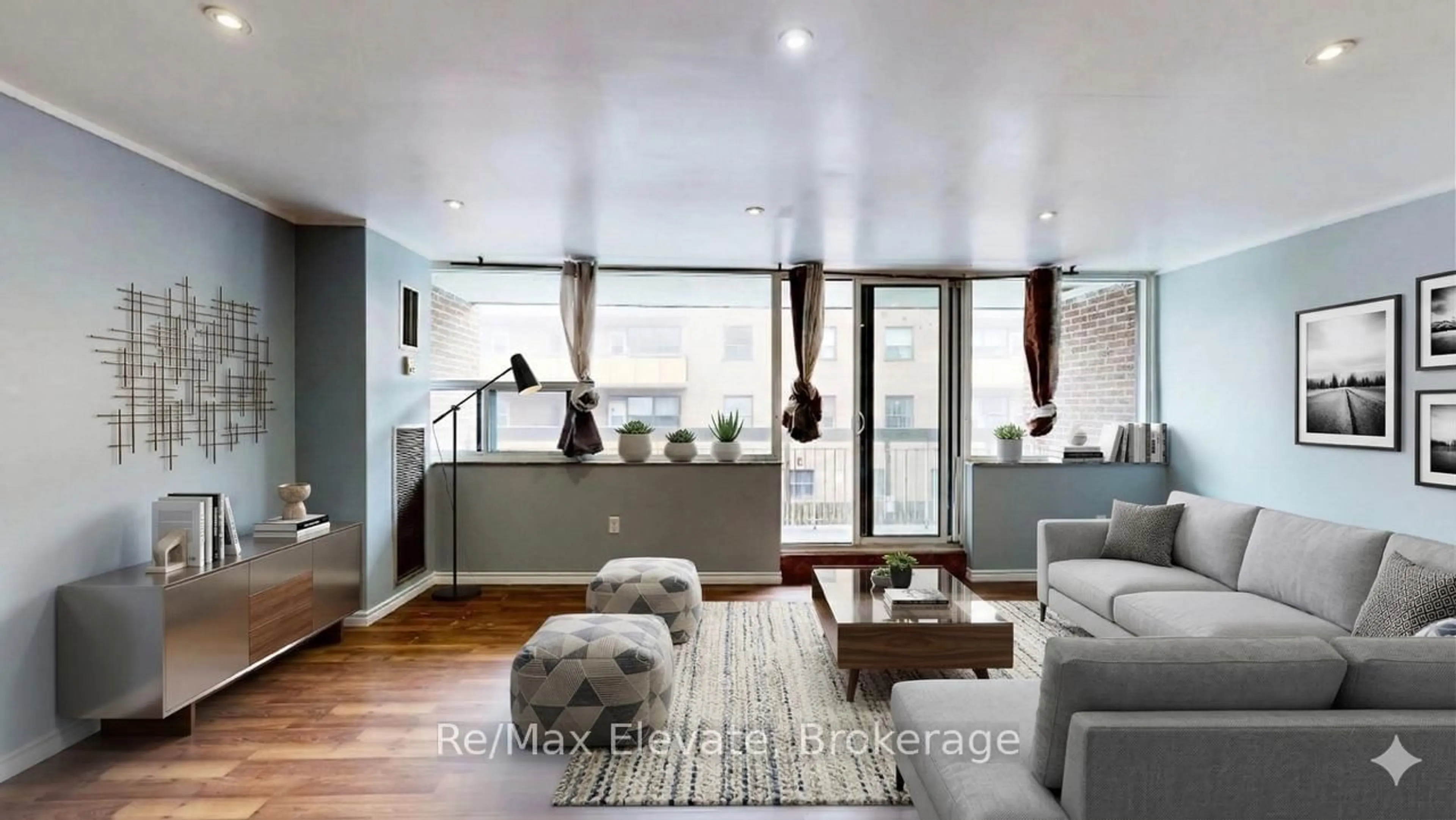 Living room with furniture, wood/laminate floor for 4060 Lawrence Ave #204, Toronto Ontario M1E 4V4