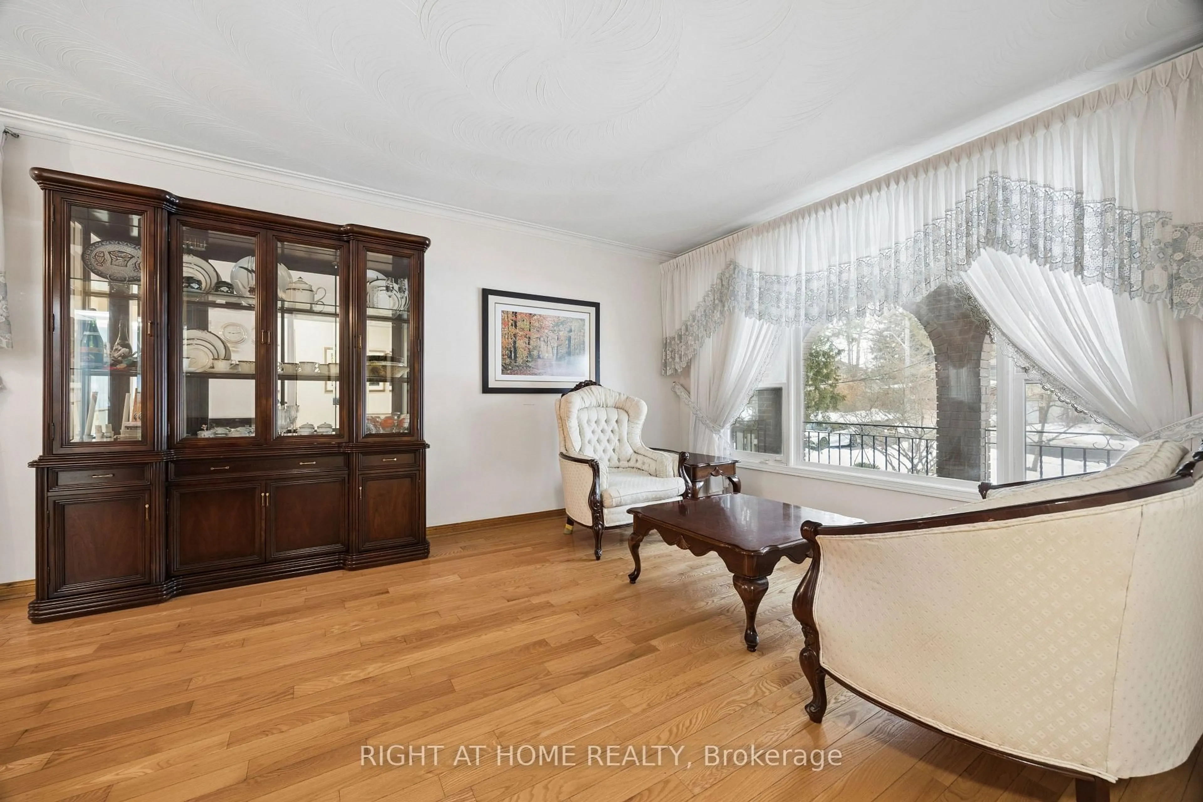 Living room with furniture, wood/laminate floor for 126 Homestead Rd, Toronto Ontario M1E 3S2