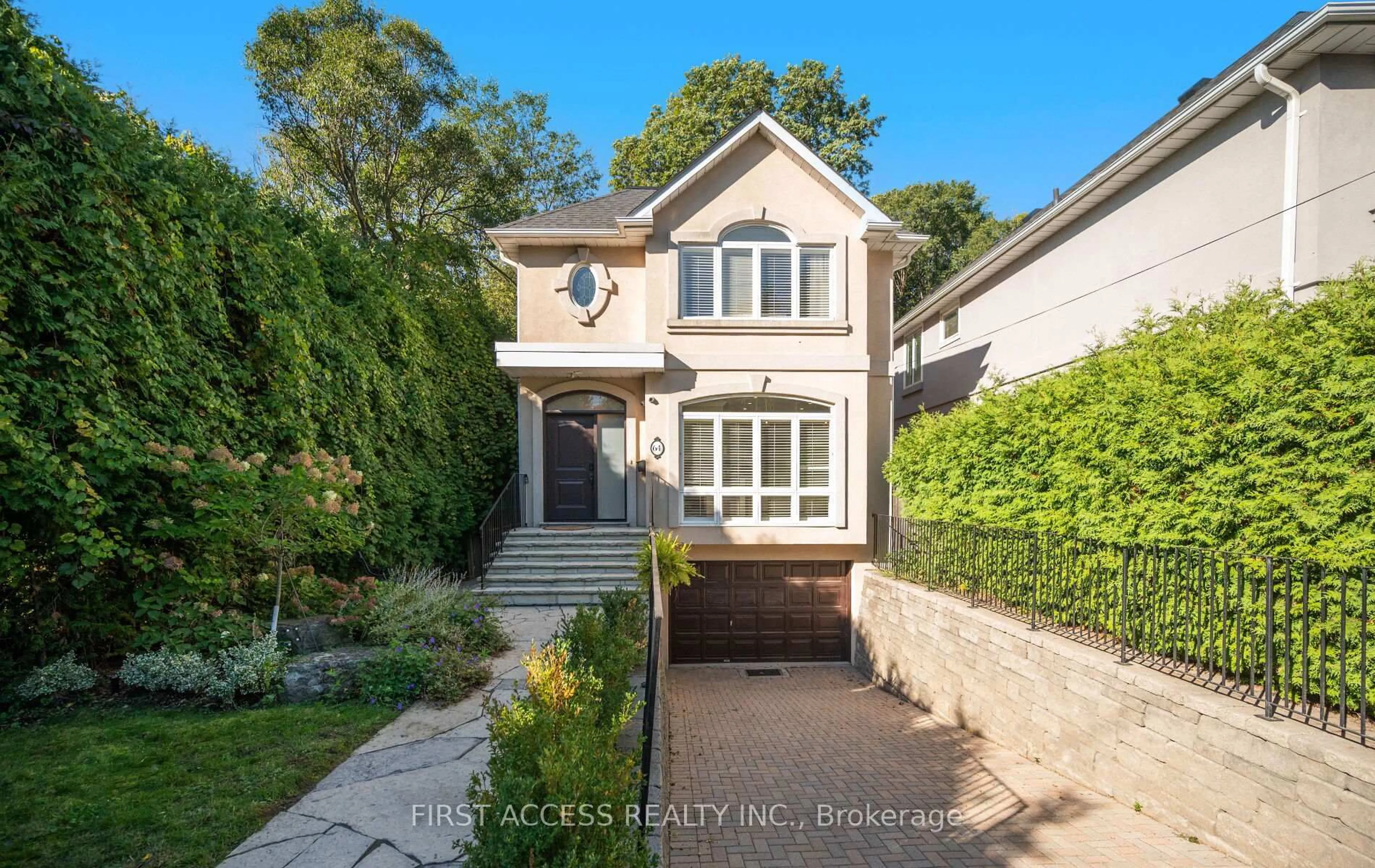 Home with brick exterior material, street for 64 Hillside Dr, Toronto Ontario M4K 2M2