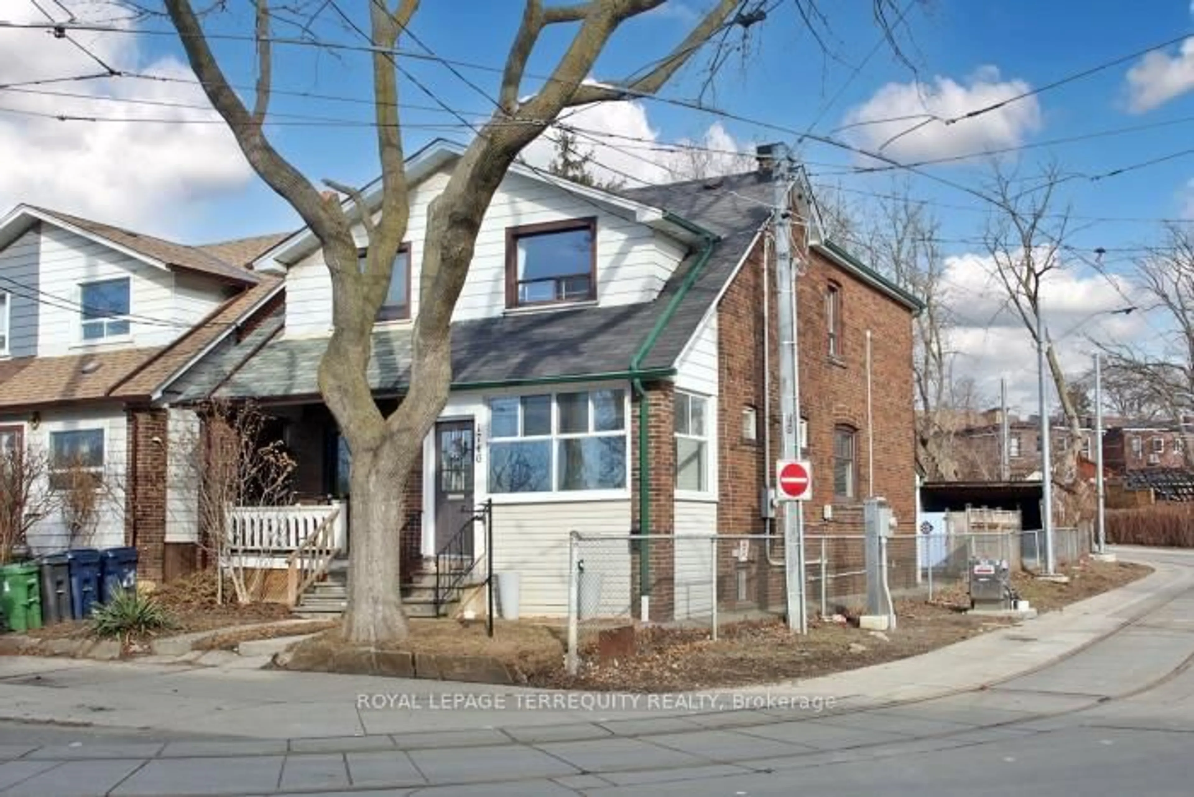 Home with brick exterior material, street for 1746 Queen St, Toronto Ontario M4L 1G7