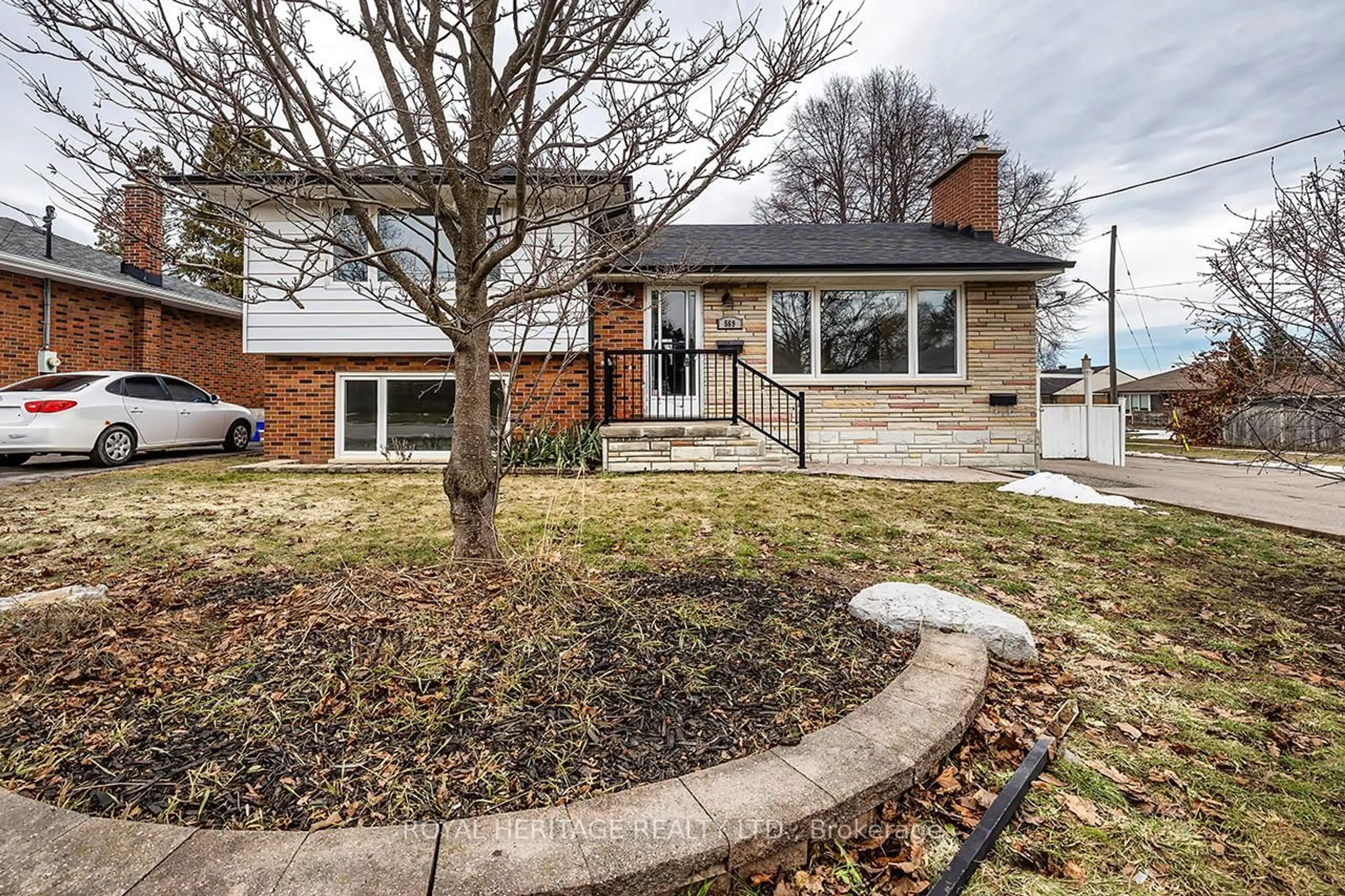 Home with brick exterior material, street for 569 Gibbons St, Oshawa Ontario L1J 4Z7