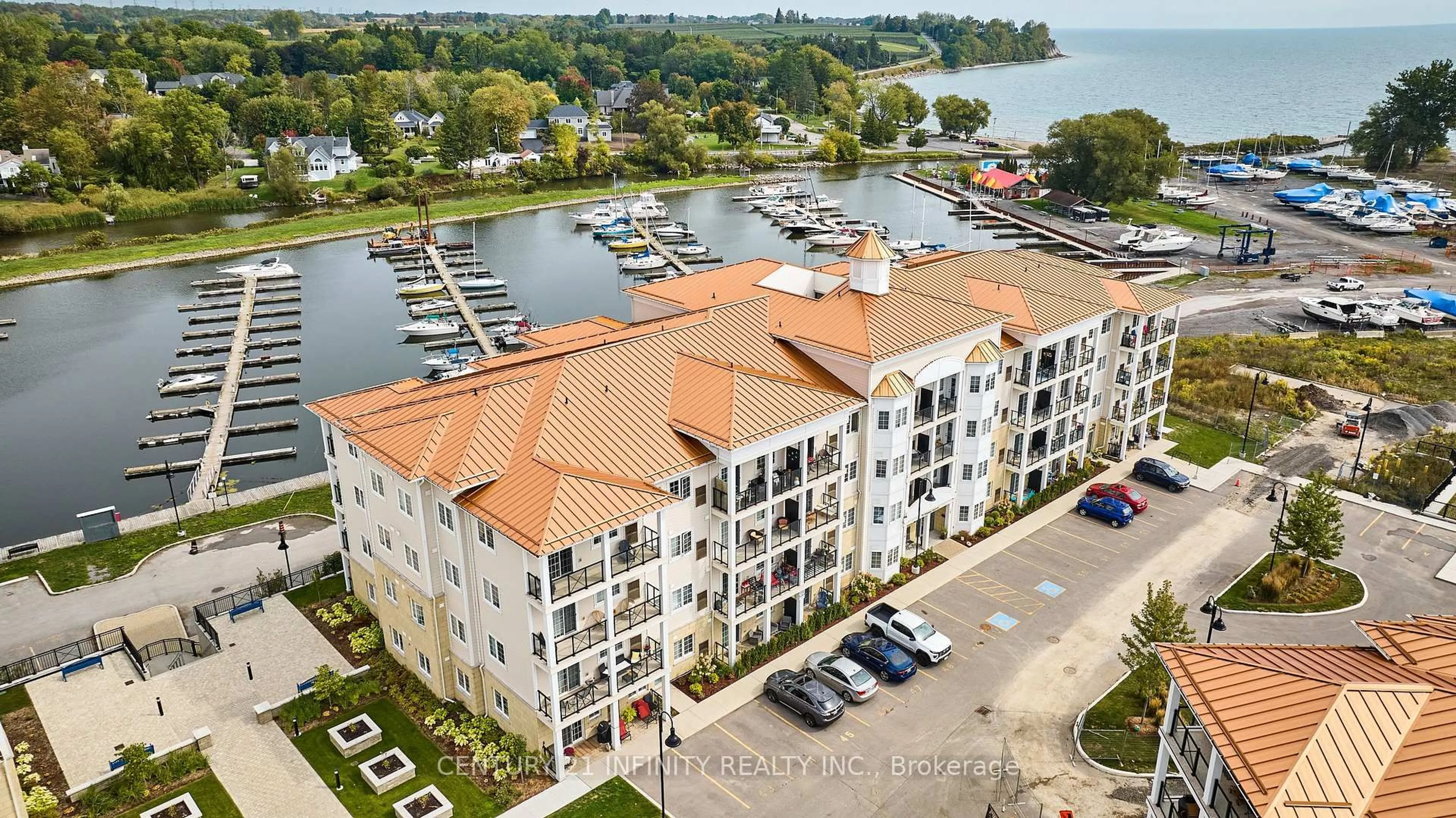 A pic from outside/outdoor area/front of a property/back of a property/a pic from drone, water/lake/river/ocean view for 70 Shipway Ave #101, Clarington Ontario L1B 0V7