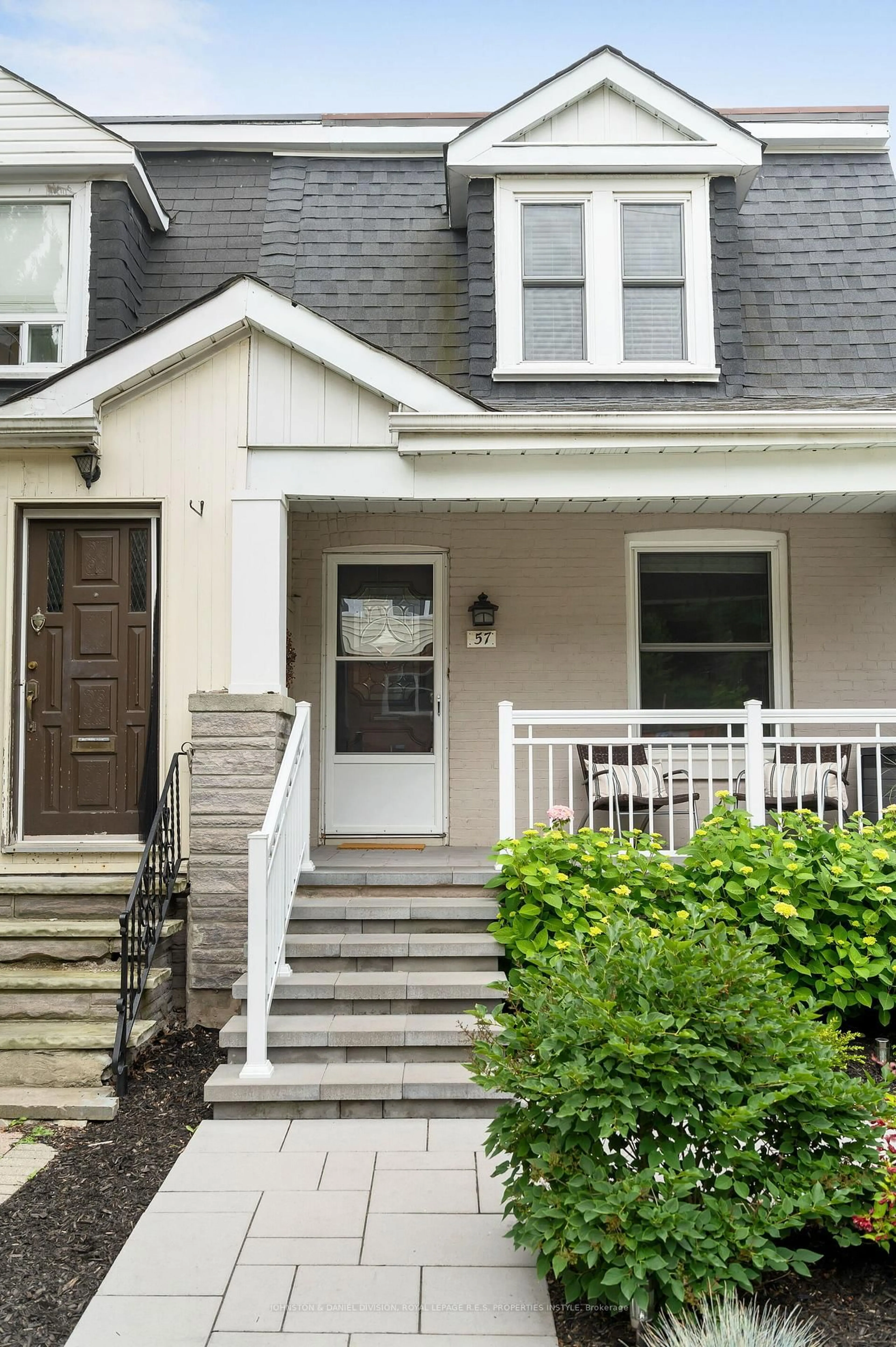 Home with vinyl exterior material, street for 57 Duvernet Ave, Toronto Ontario M4L 2G8