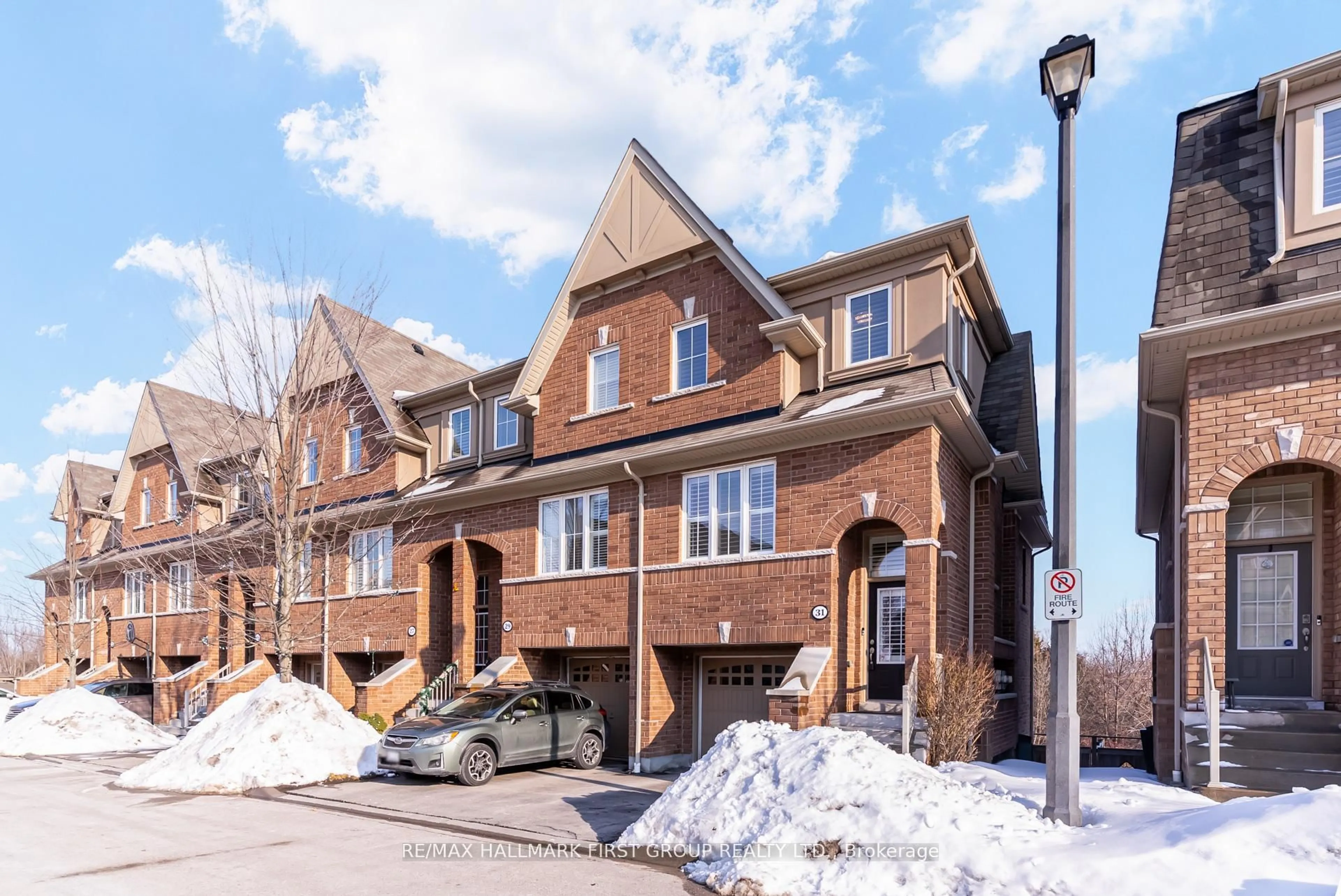 Home with brick exterior material, street for 31 Reevesmere Lane, Ajax Ontario L1Z 0L3