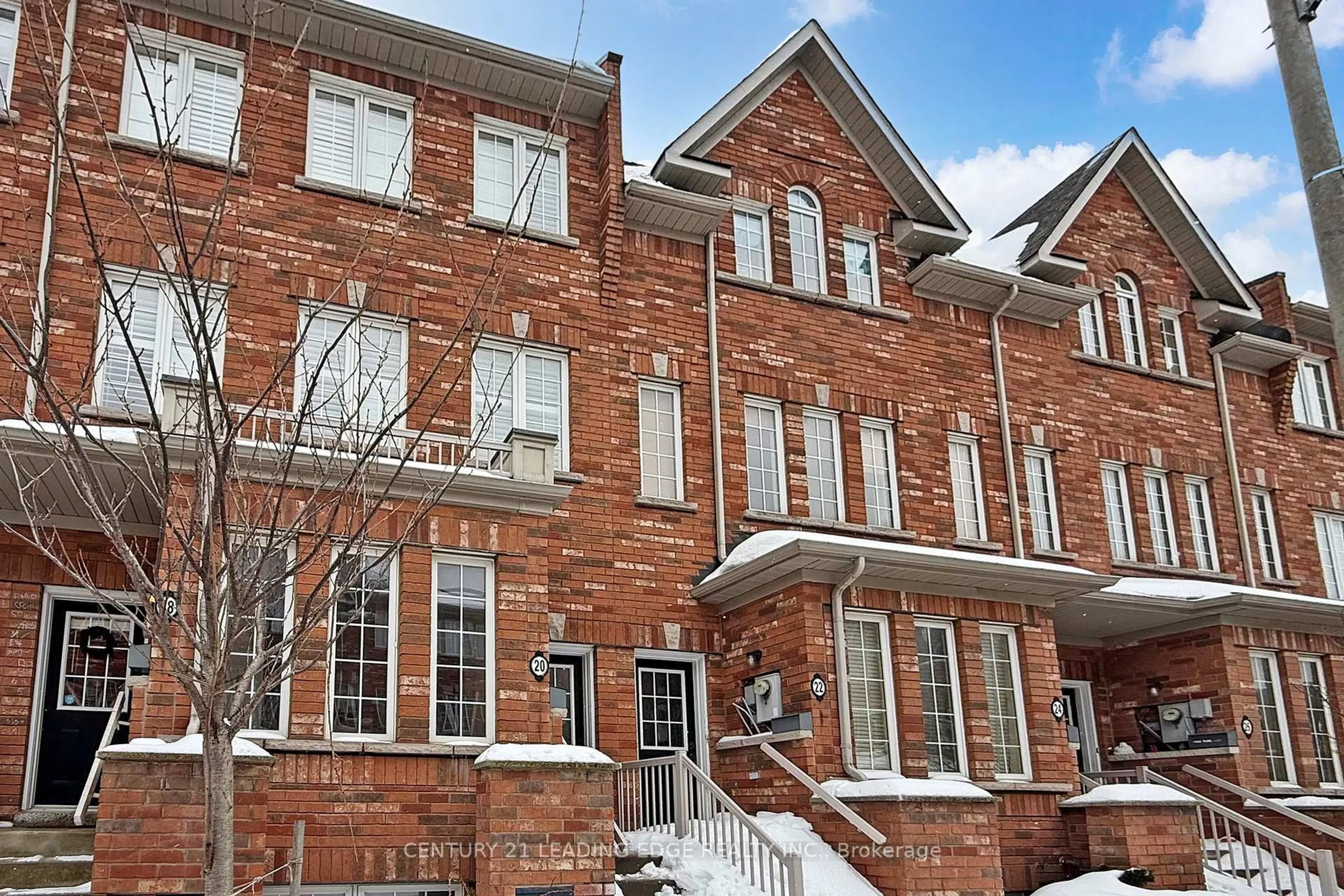 Home with brick exterior material, street for 20 Carnahan Terr, Toronto Ontario M4E 0B2