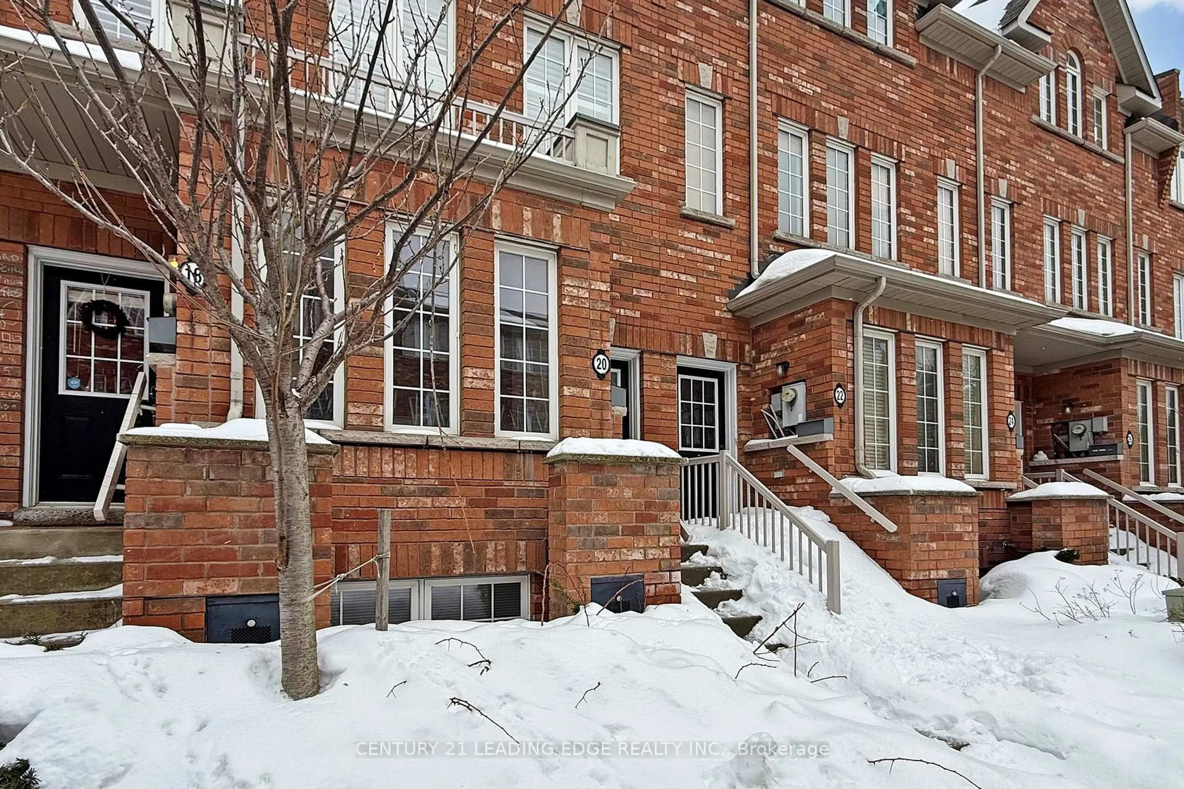 Home with brick exterior material, street for 20 Carnahan Terr, Toronto Ontario M4E 0B2