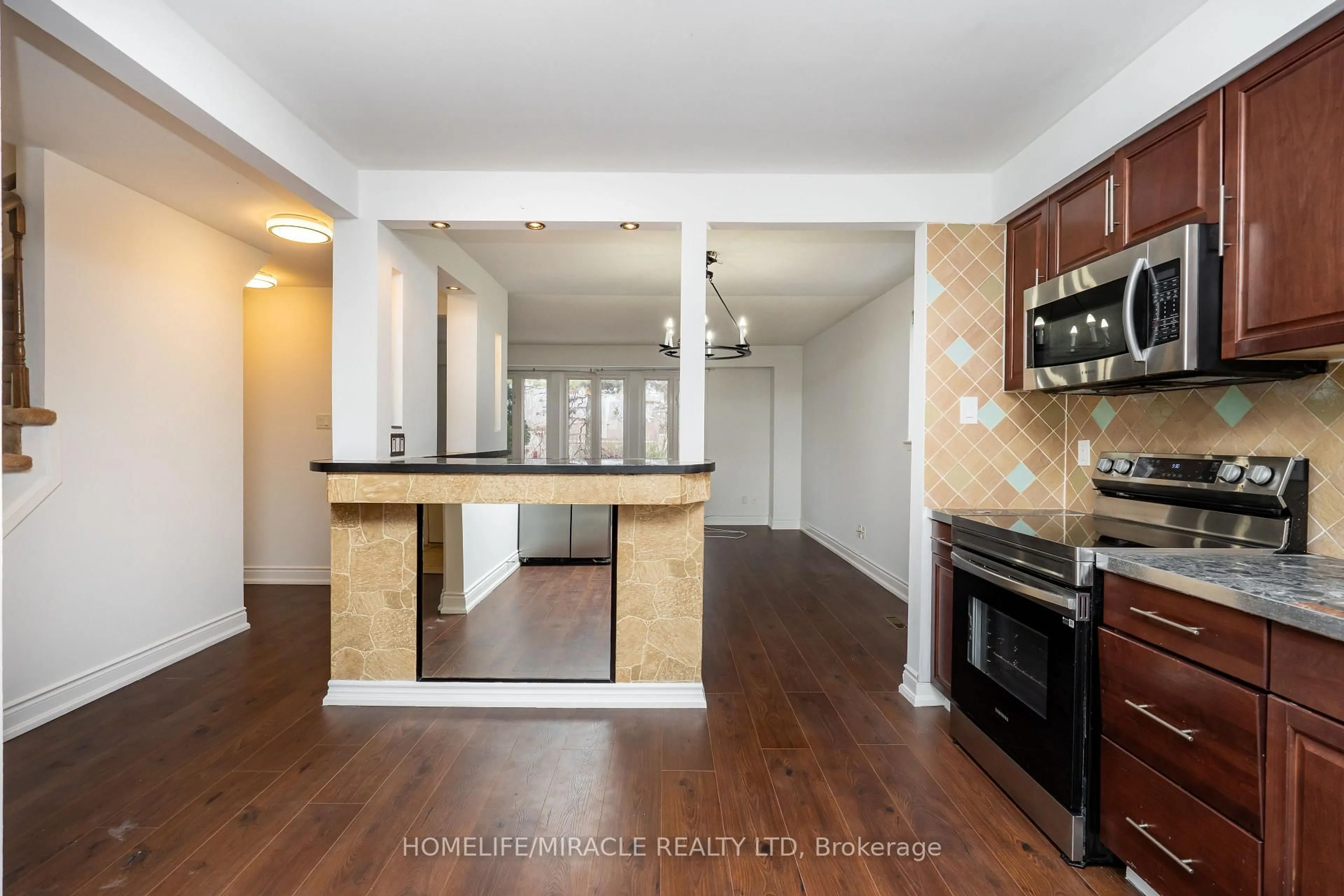 Open concept kitchen, wood/laminate floor for 37 Banner Cres, Ajax Ontario L1S 3S8