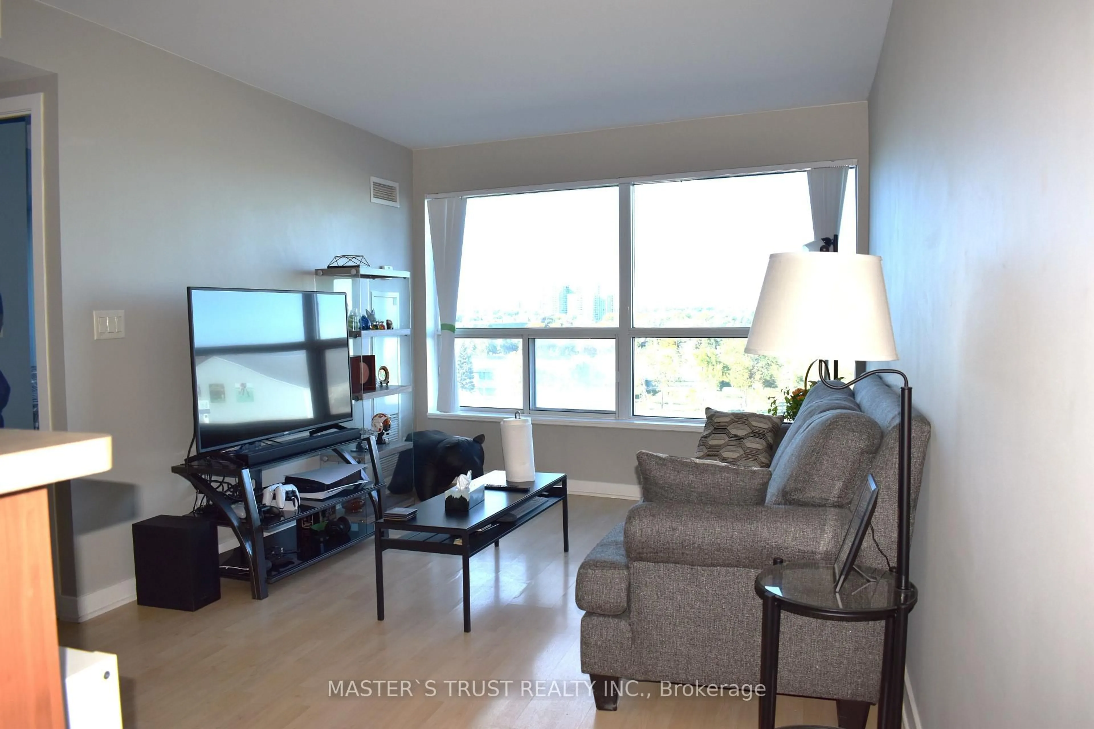 Living room with furniture, unknown for 36 Lee Centre Dr #702, Toronto Ontario M1H 3J1