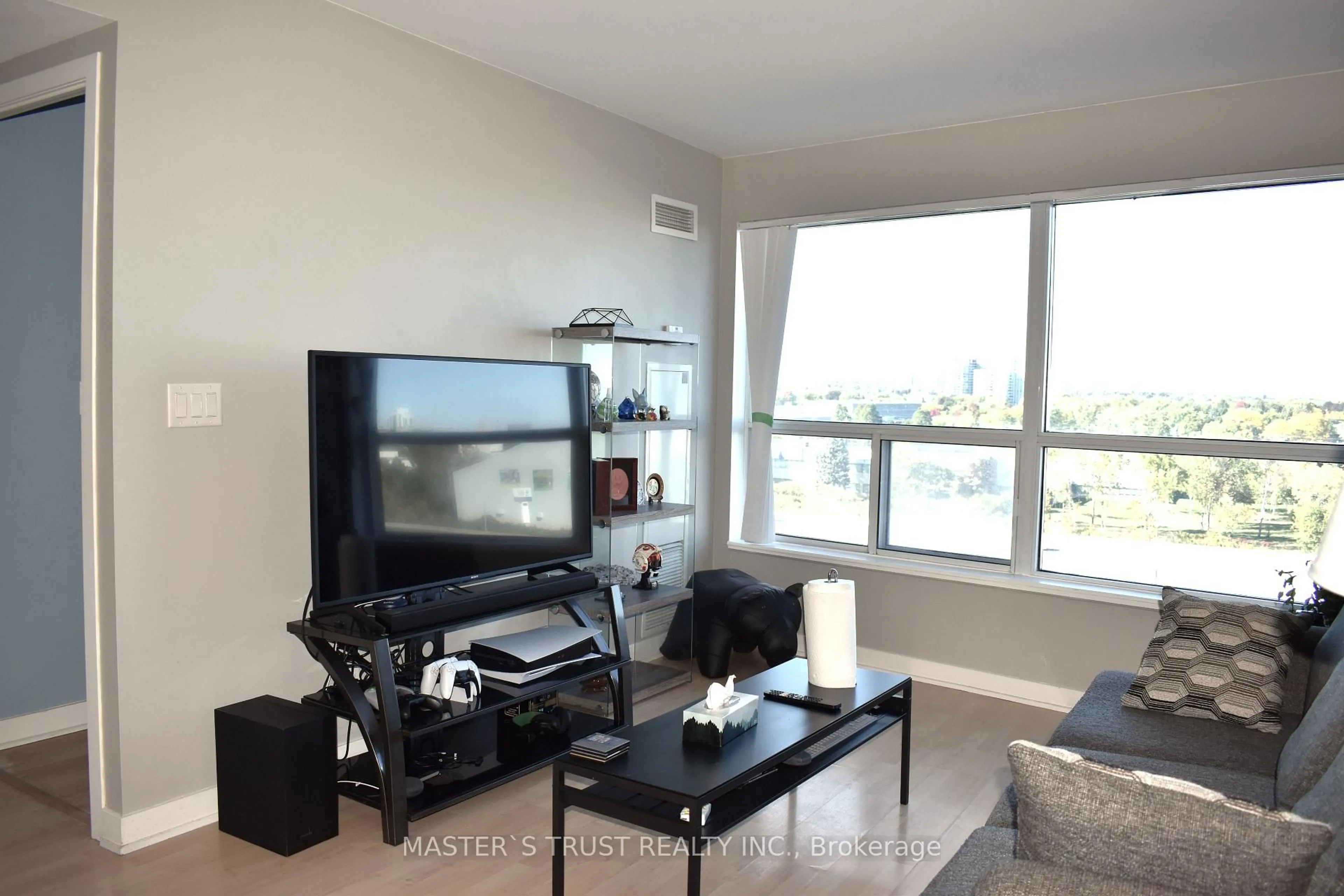 Living room with furniture, unknown for 36 Lee Centre Dr #702, Toronto Ontario M1H 3J1
