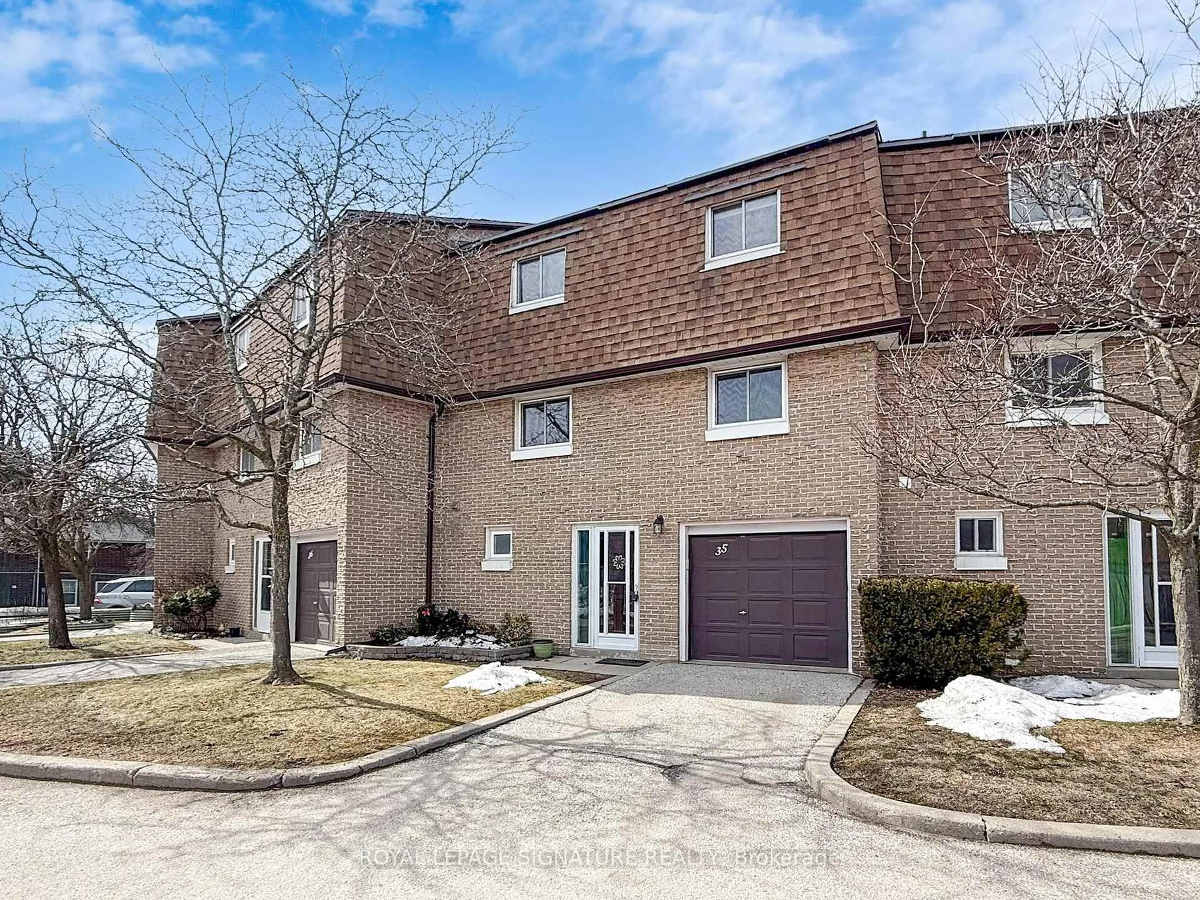 Home with brick exterior material, street for 671 Huntingwood Dr #35, Toronto Ontario M1W 1H6