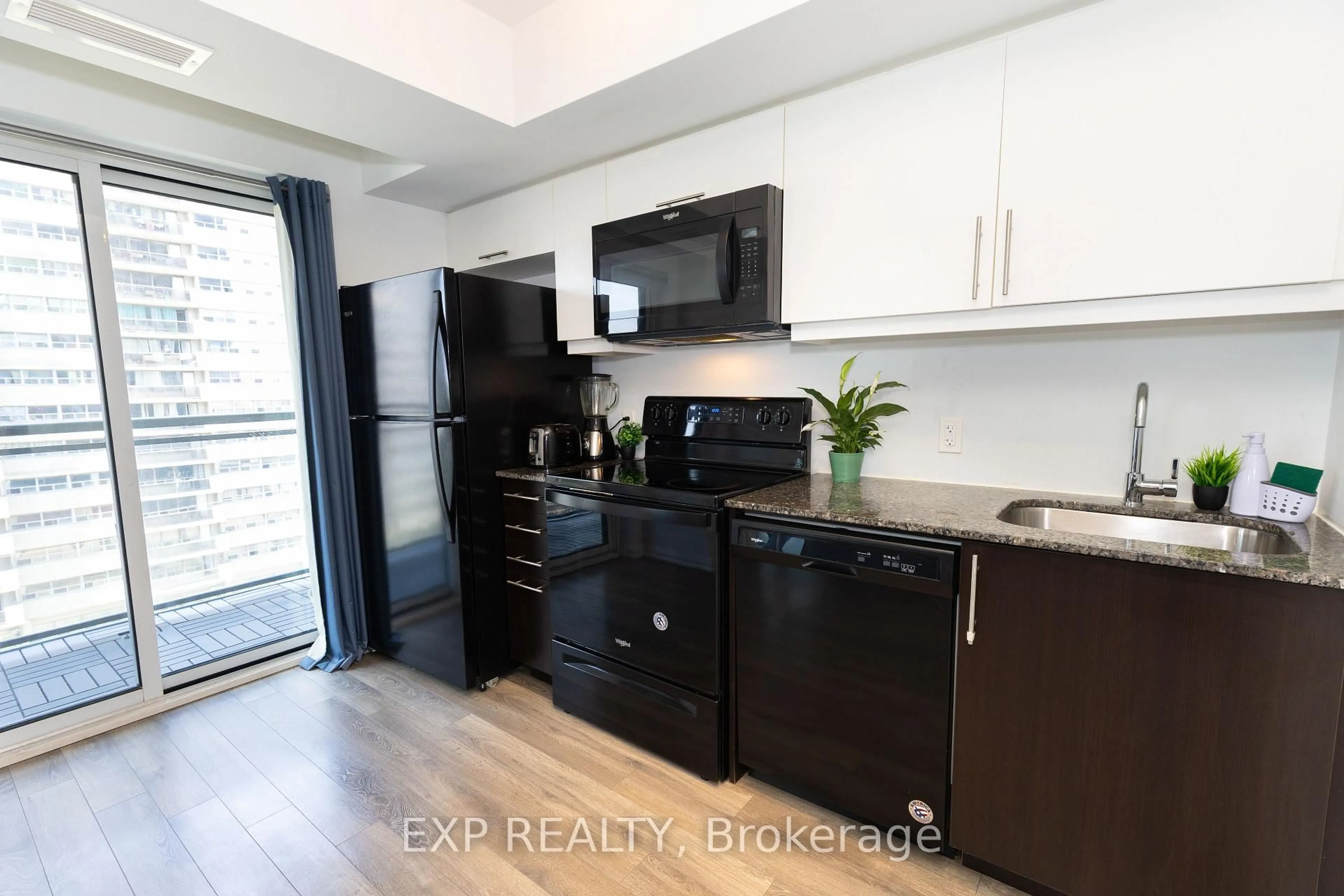 Standard kitchen, wood/laminate floor for 30 Meadowglen Pl #707, Toronto Ontario M1G 0A6