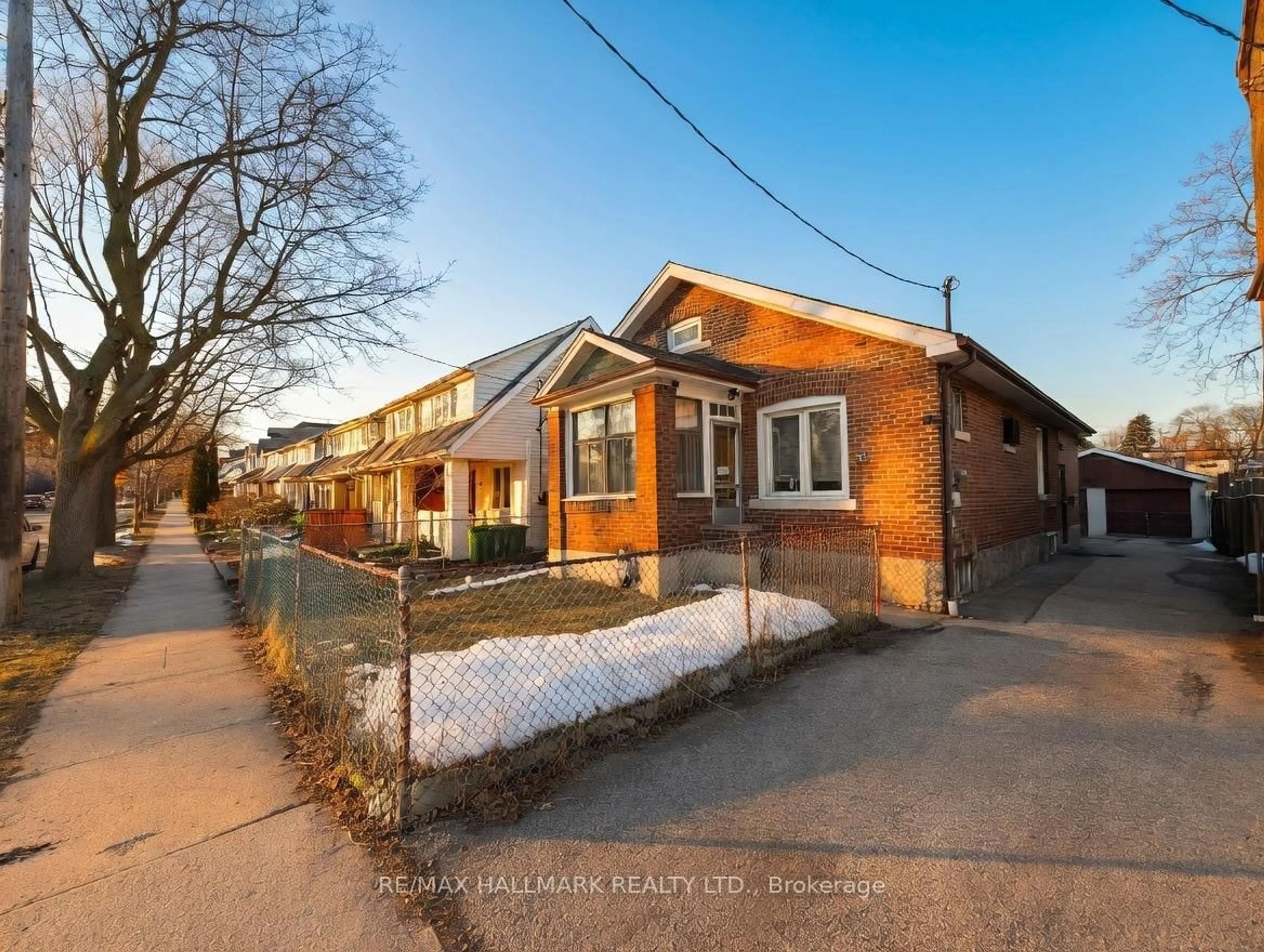 Home with brick exterior material, street for 51 Alton Ave, Toronto Ontario M4L 2M3