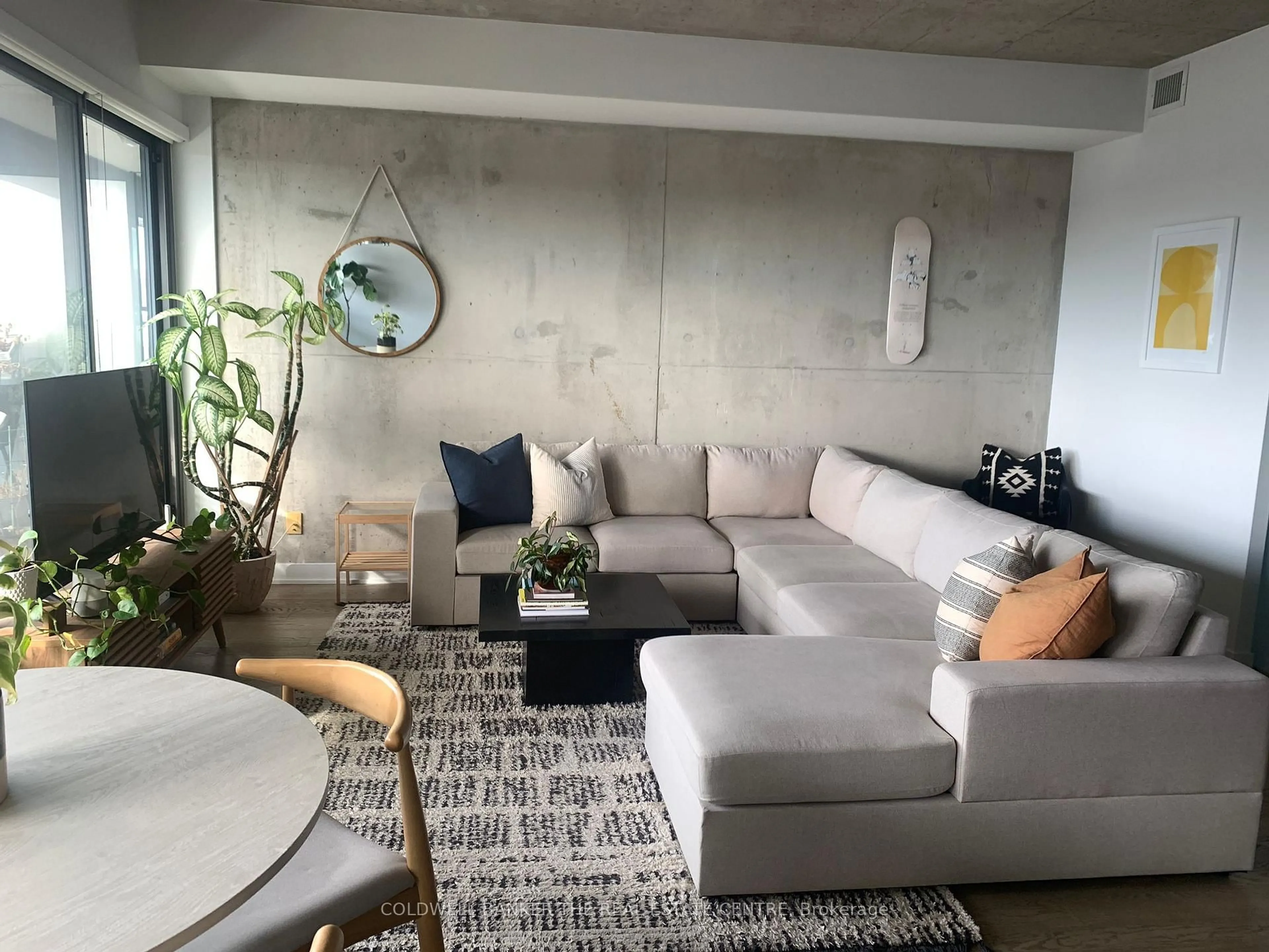 Living room with furniture, unknown for 319 Carlaw Ave #503, Toronto Ontario M4M 0A4