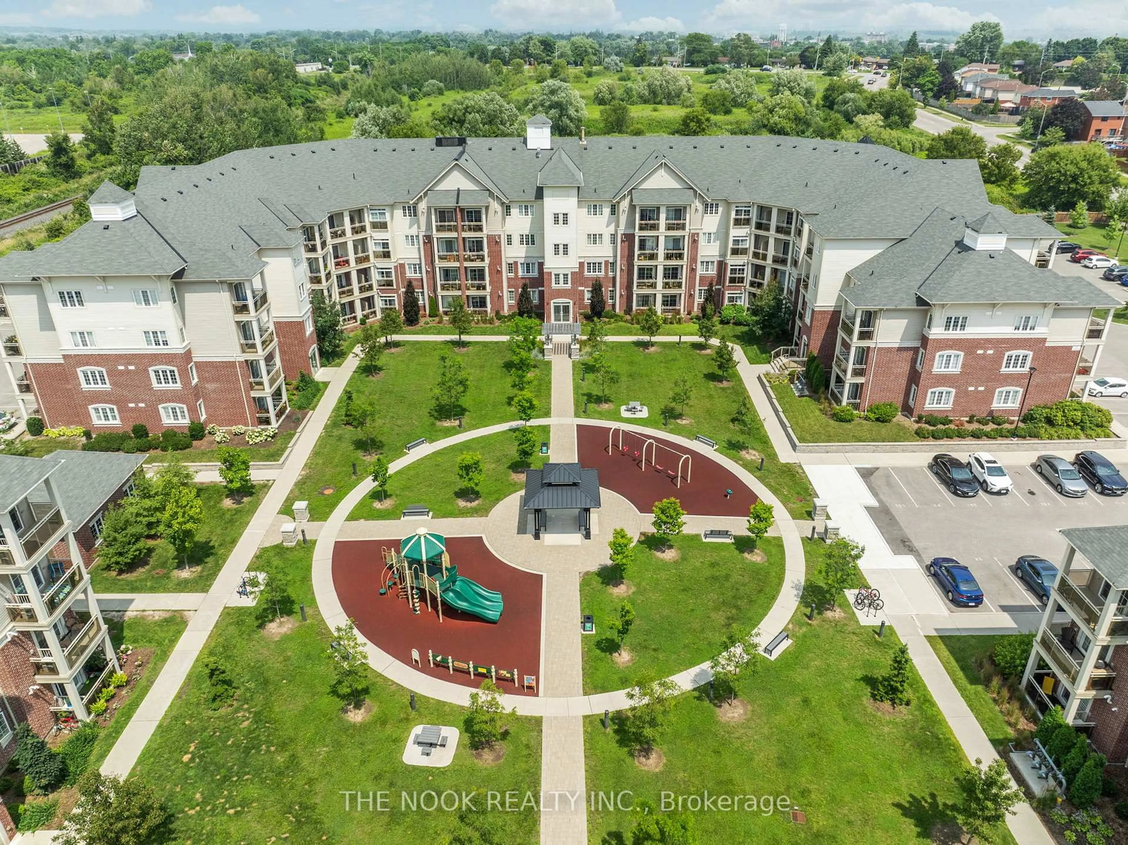 A pic from outside/outdoor area/front of a property/back of a property/a pic from drone, city buildings view from balcony for 80 Aspen Springs Dr #229, Clarington Ontario L1C 0V4