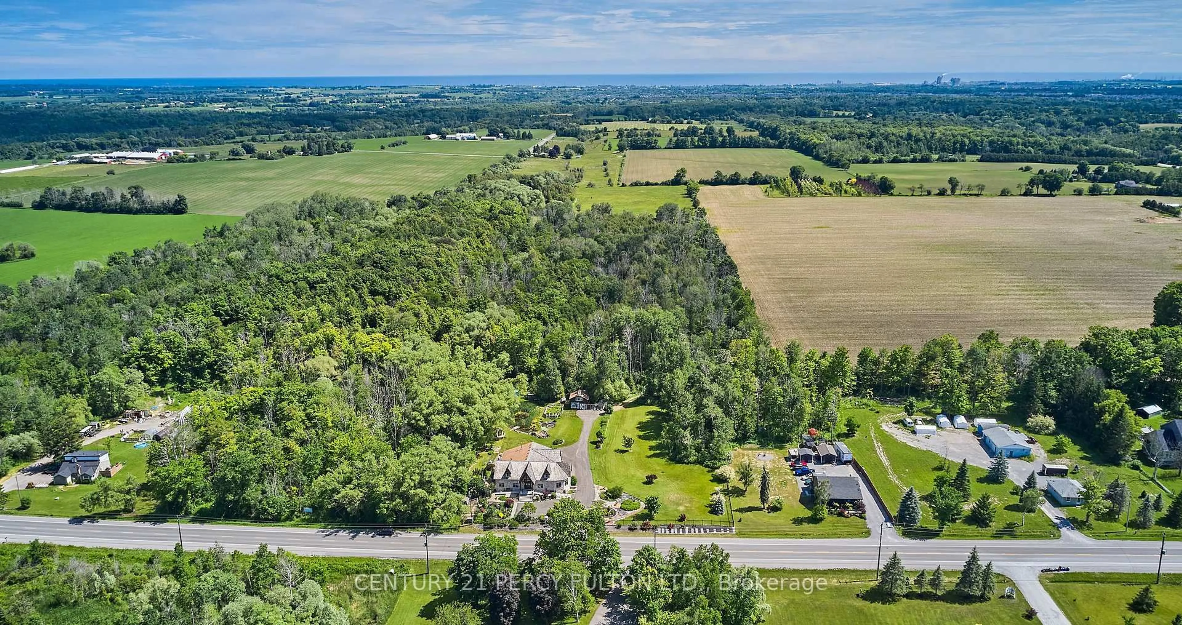 A pic from outside/outdoor area/front of a property/back of a property/a pic from drone, forest/trees view for 2733 Taunton Rd, Clarington Ontario L1C 7B1