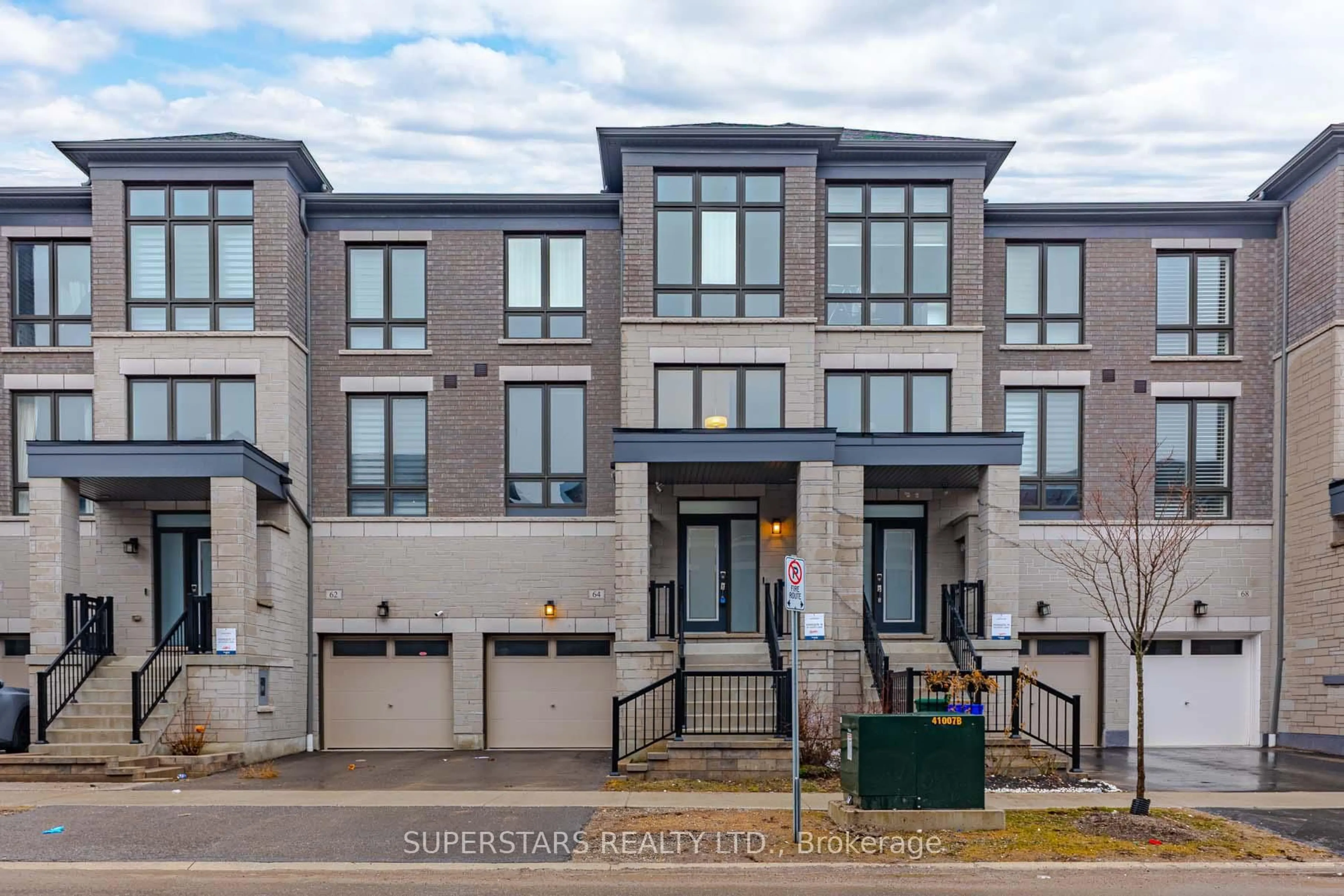 Home with brick exterior material, street for 64 Douet Lane, Ajax Ontario L1Z 0V4