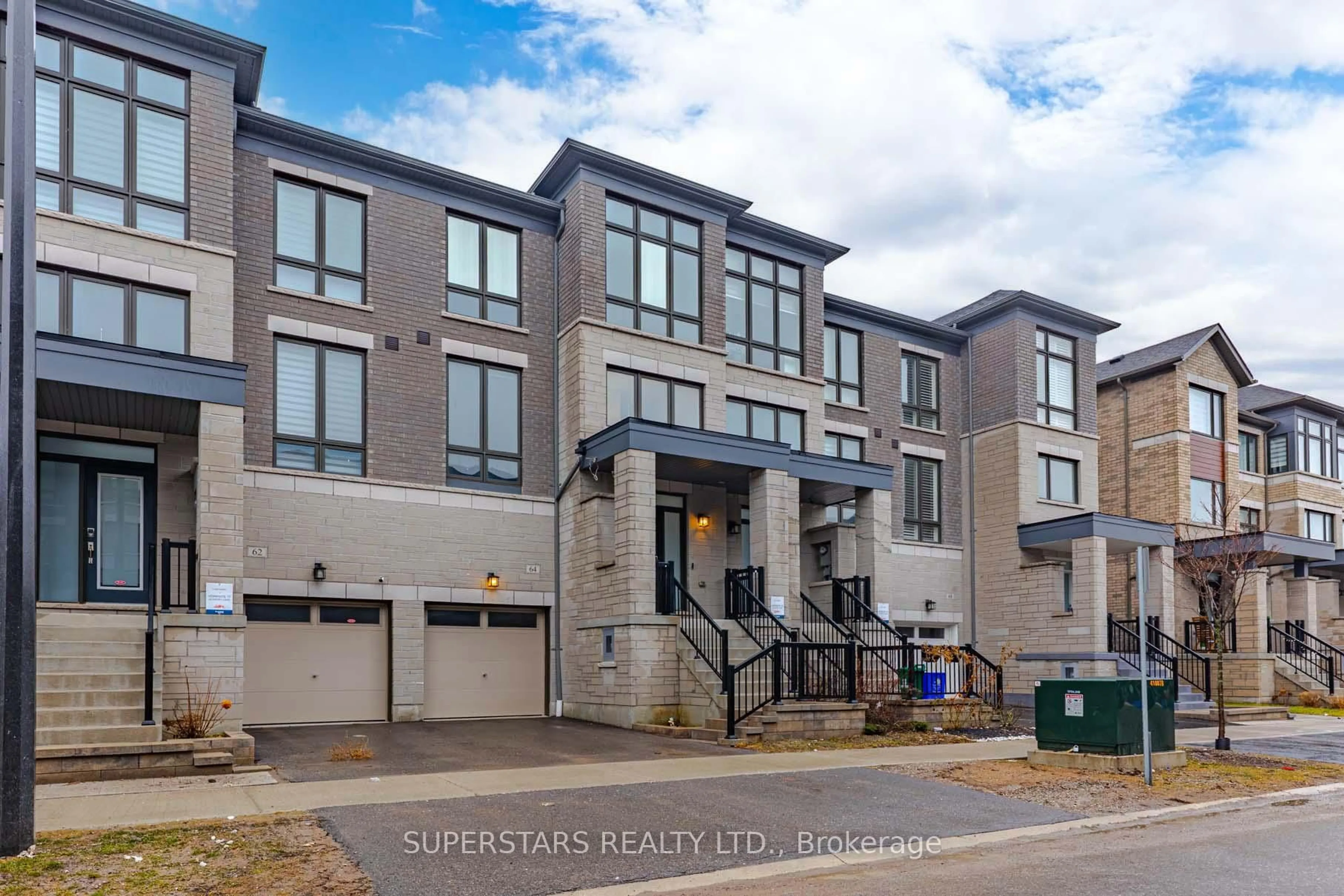 Home with brick exterior material, street for 64 Douet Lane, Ajax Ontario L1Z 0V4