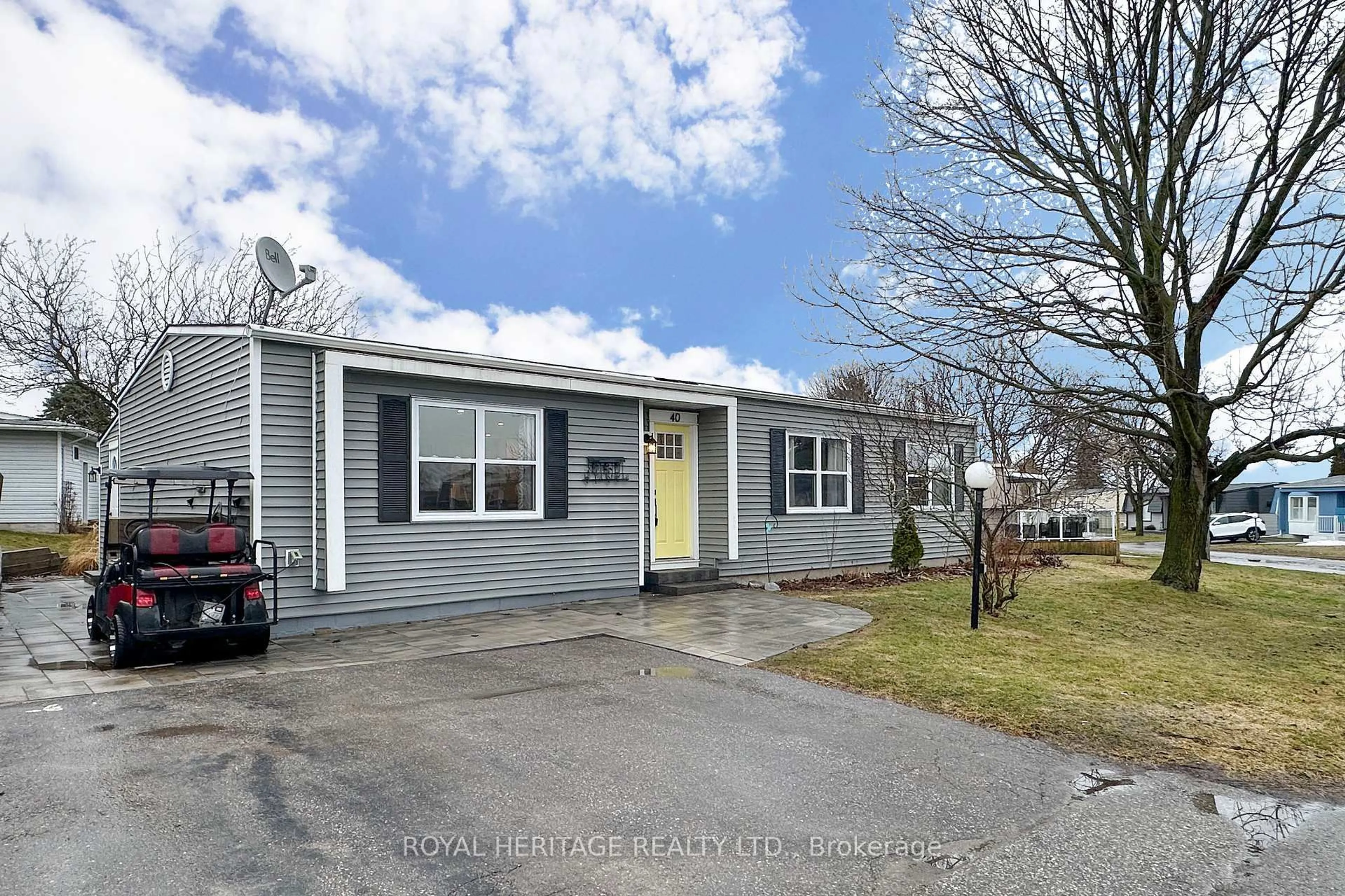 Home with vinyl exterior material, street for 40 Bluffs Rd, Clarington Ontario L1B 1A3