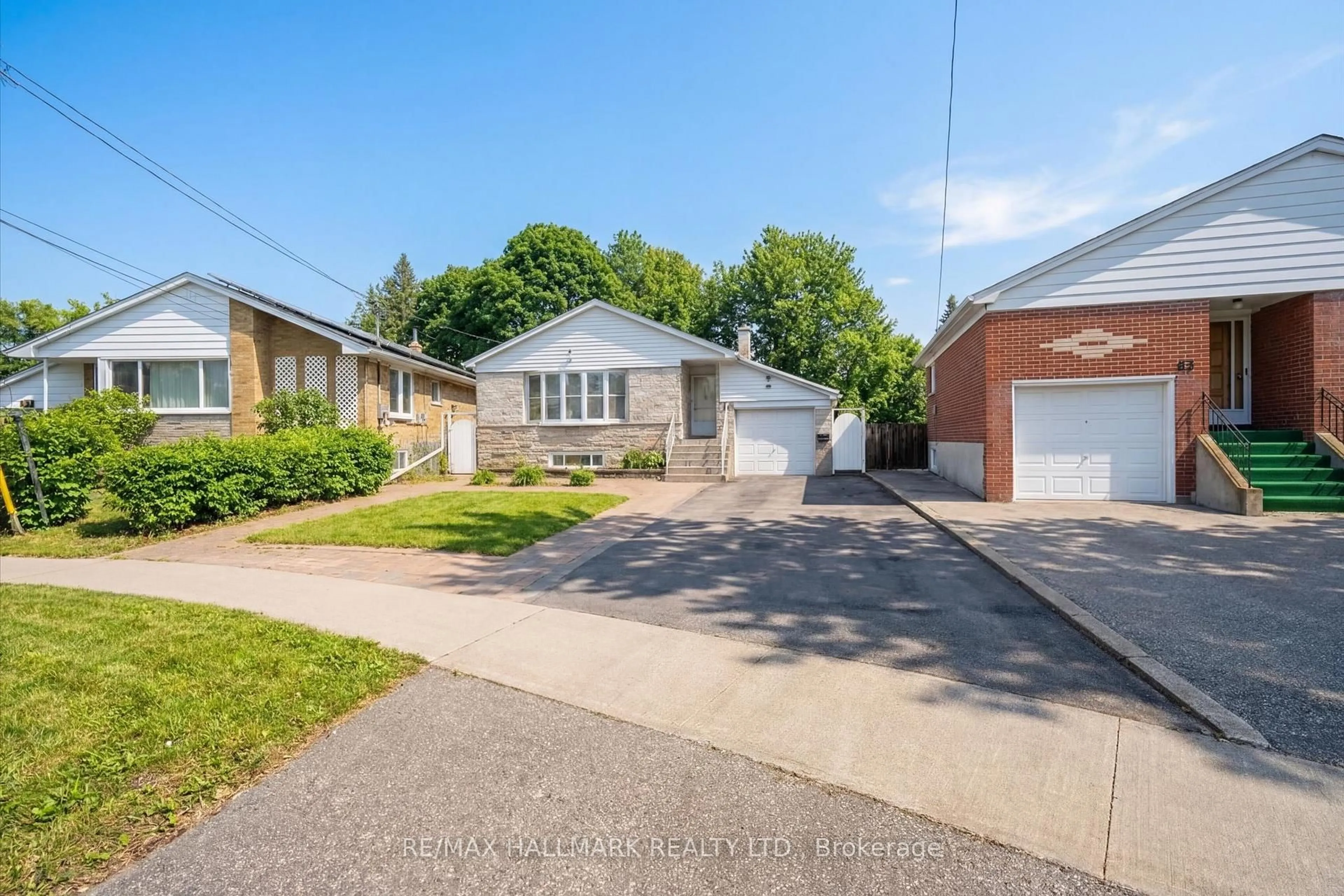 Home with brick exterior material, street for 65 Montvale Dr, Toronto Ontario M1M 3E5