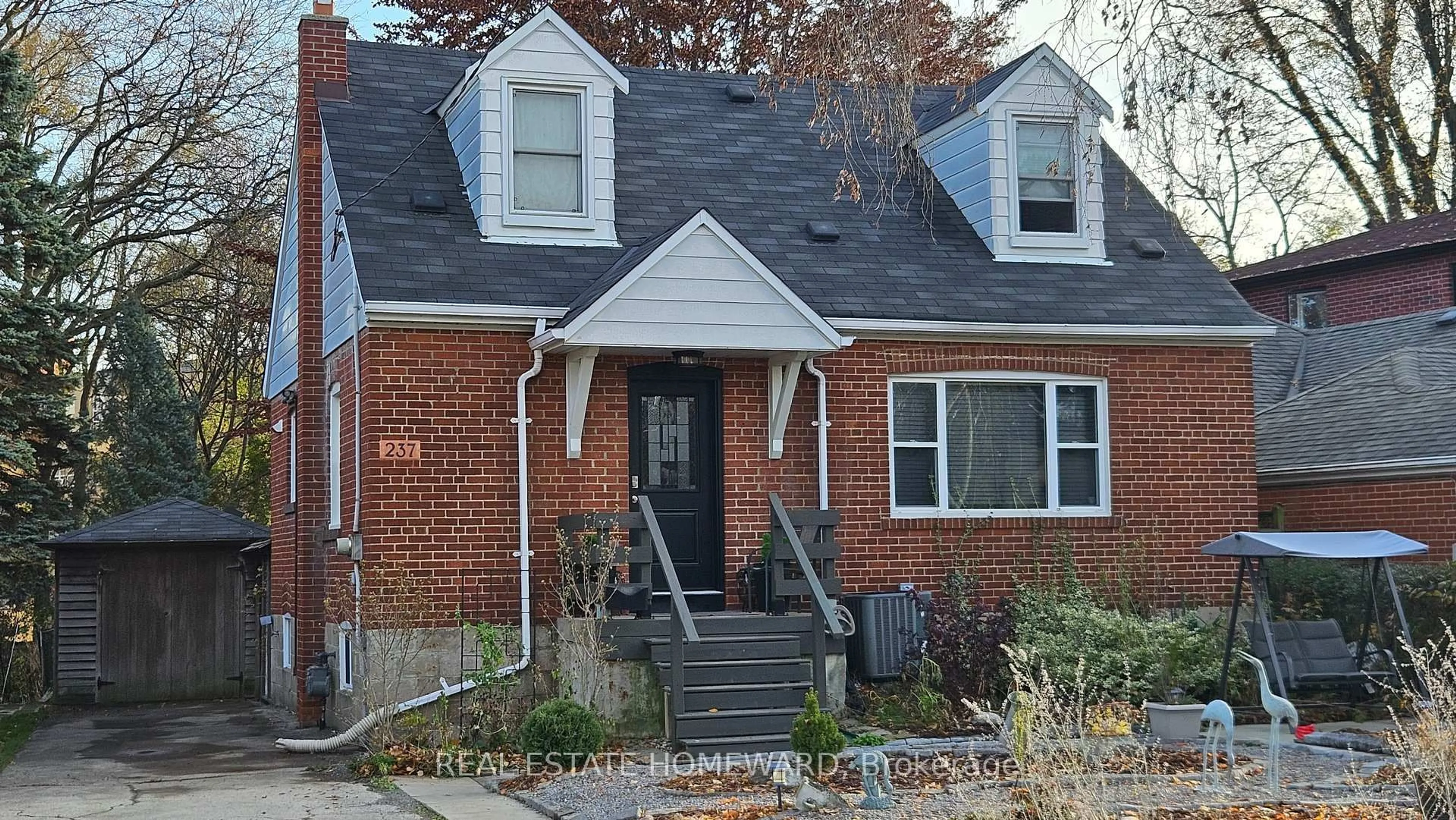 Home with brick exterior material, street for 237 Ferris Rd, Toronto Ontario M4B 1H2