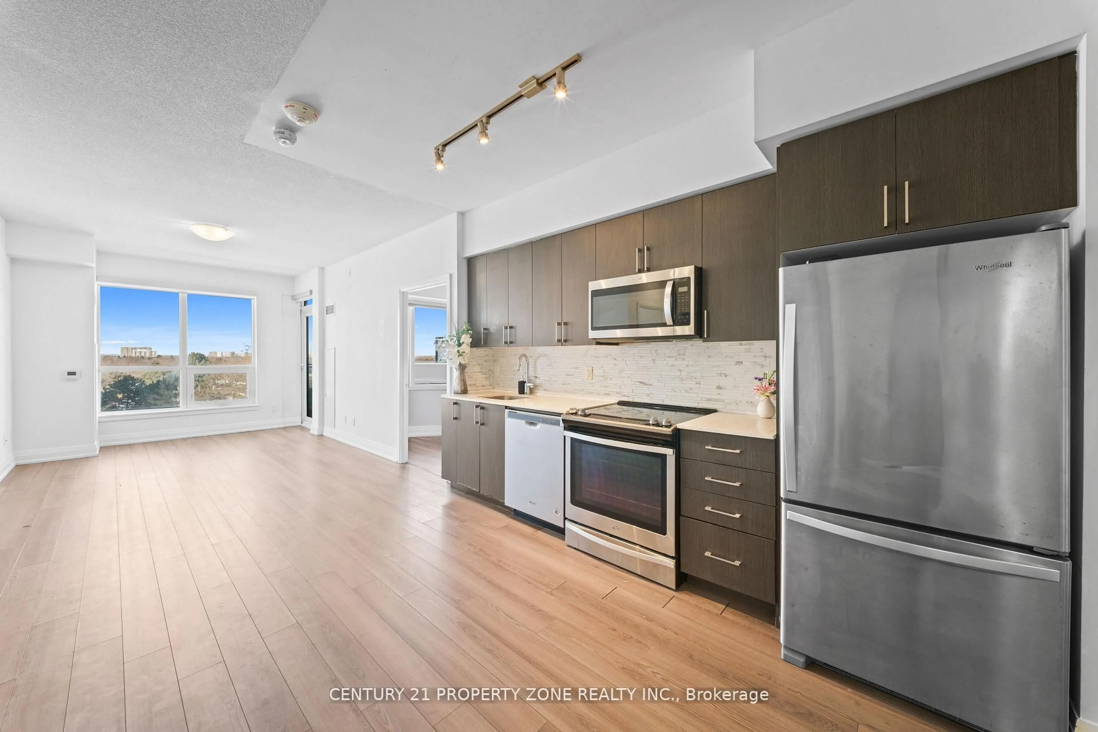 Open concept kitchen, unknown for 3121 Sheppard Ave #710, Toronto Ontario M1T 0B6