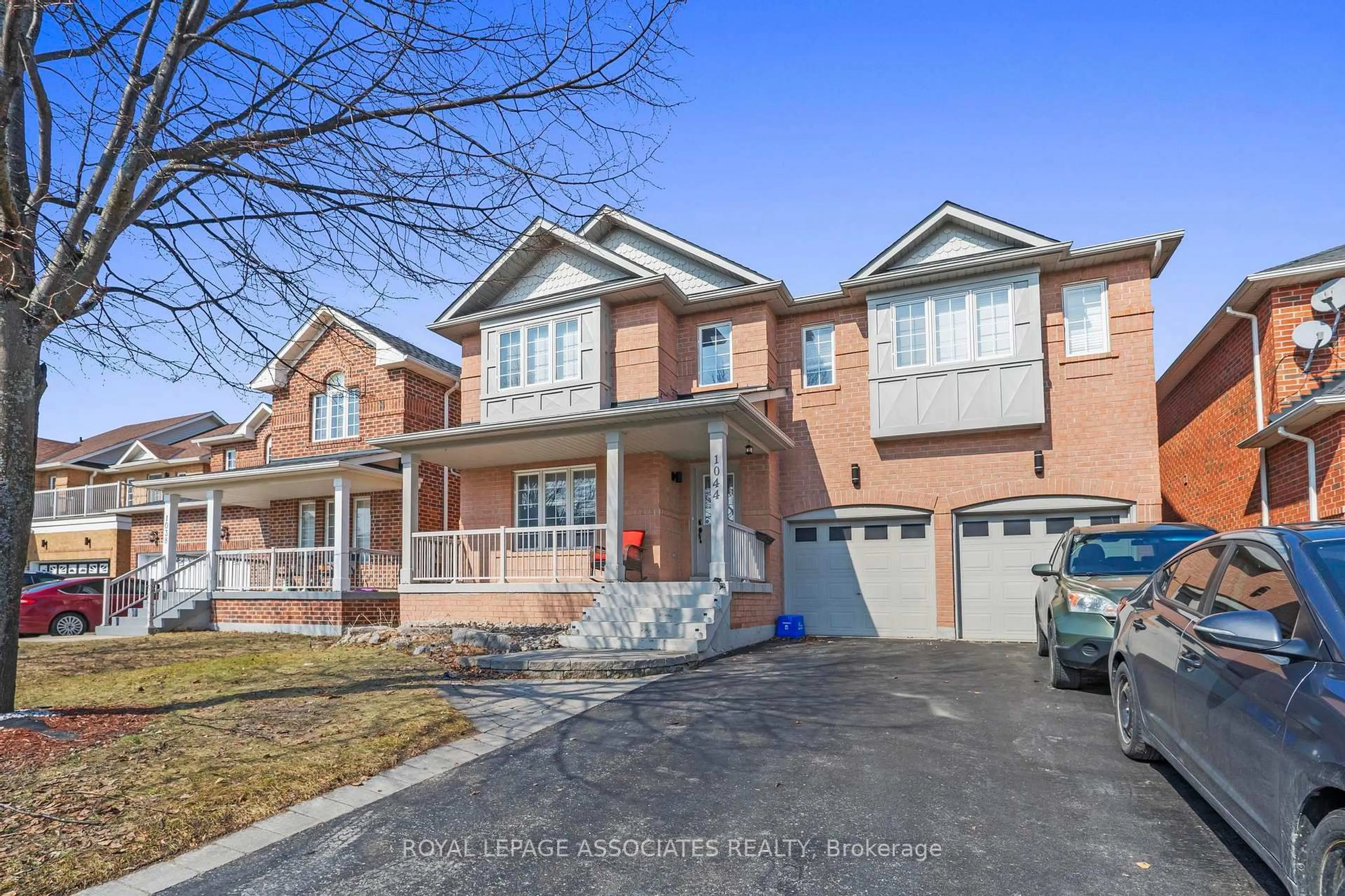 Home with brick exterior material, street for 1044 Langford St, Oshawa Ontario L1K 2W1