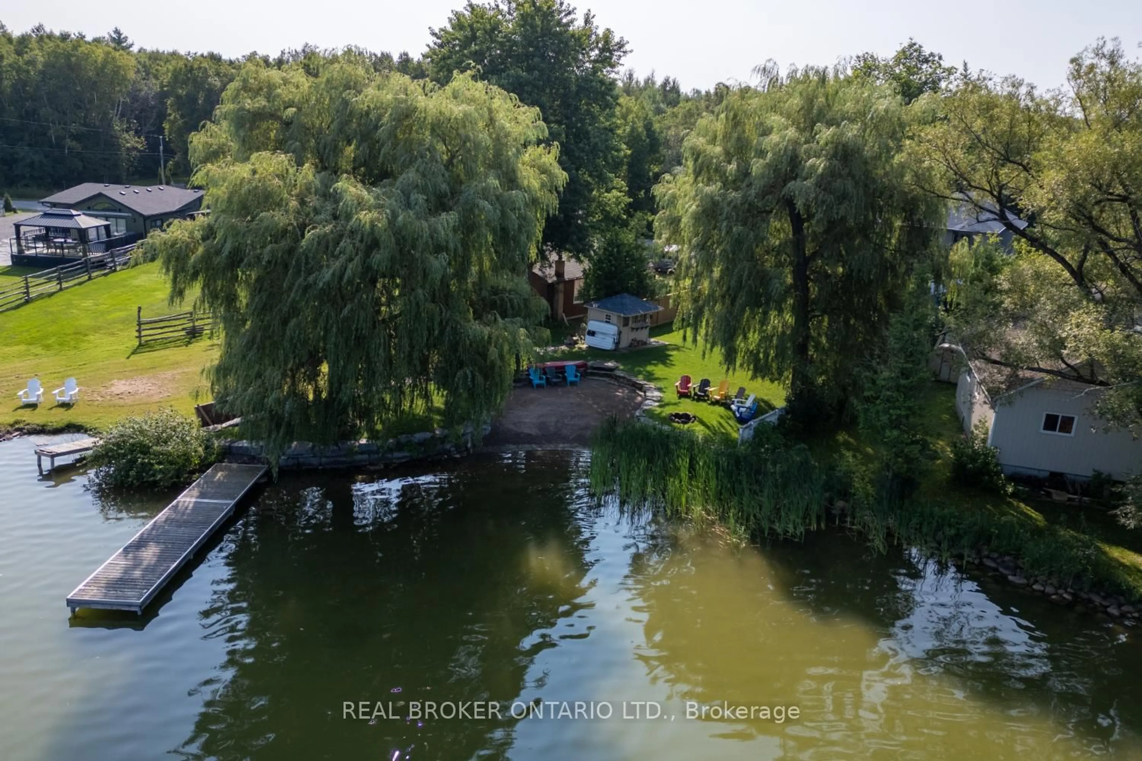 A pic from outside/outdoor area/front of a property/back of a property/a pic from drone, water/lake/river/ocean view for 526 View Lake Rd, Scugog Ontario L0B 1K0