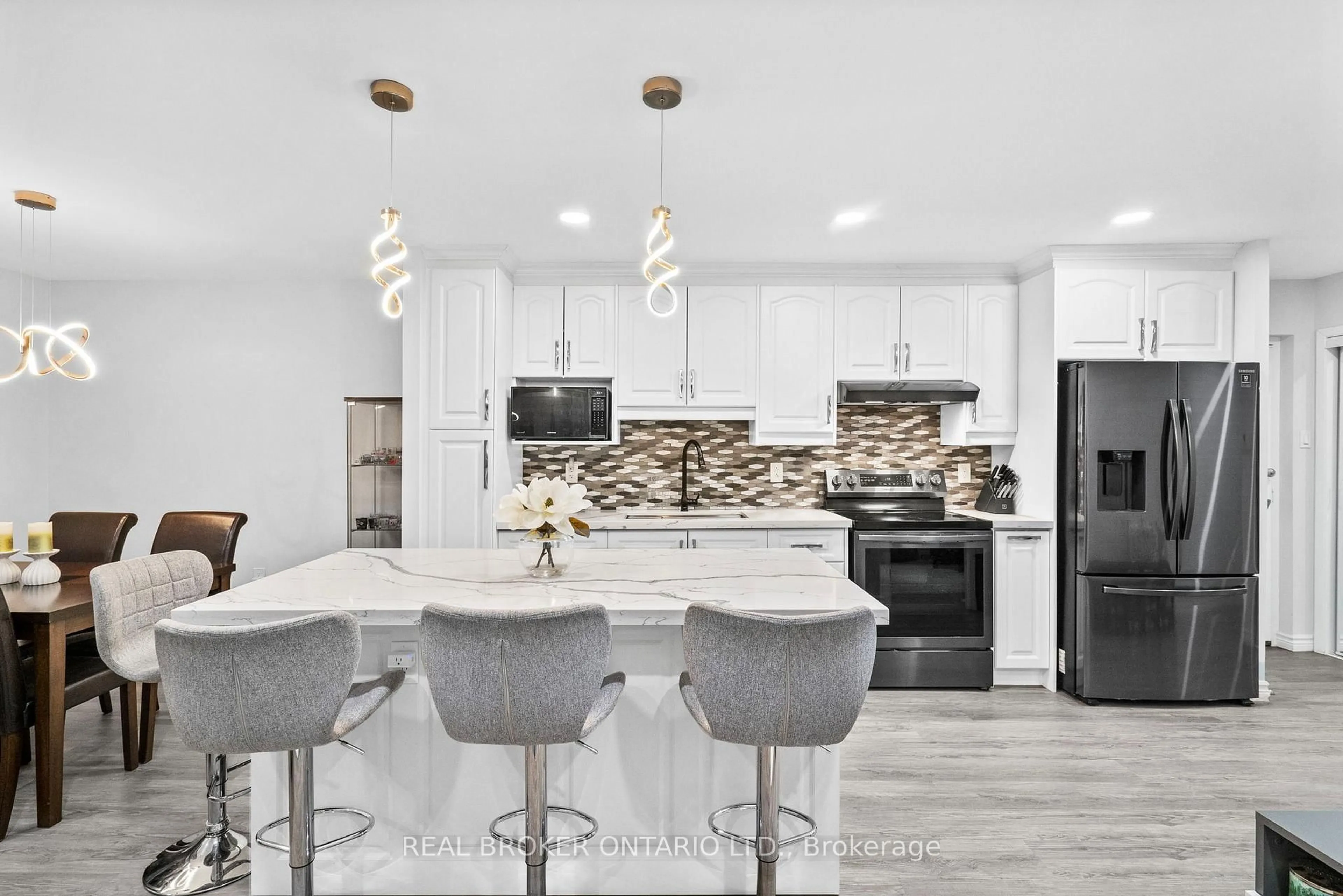 Open concept kitchen, ceramic/tile floor for 1200 Bridletowne Circ #102, Toronto Ontario M1W 2T9