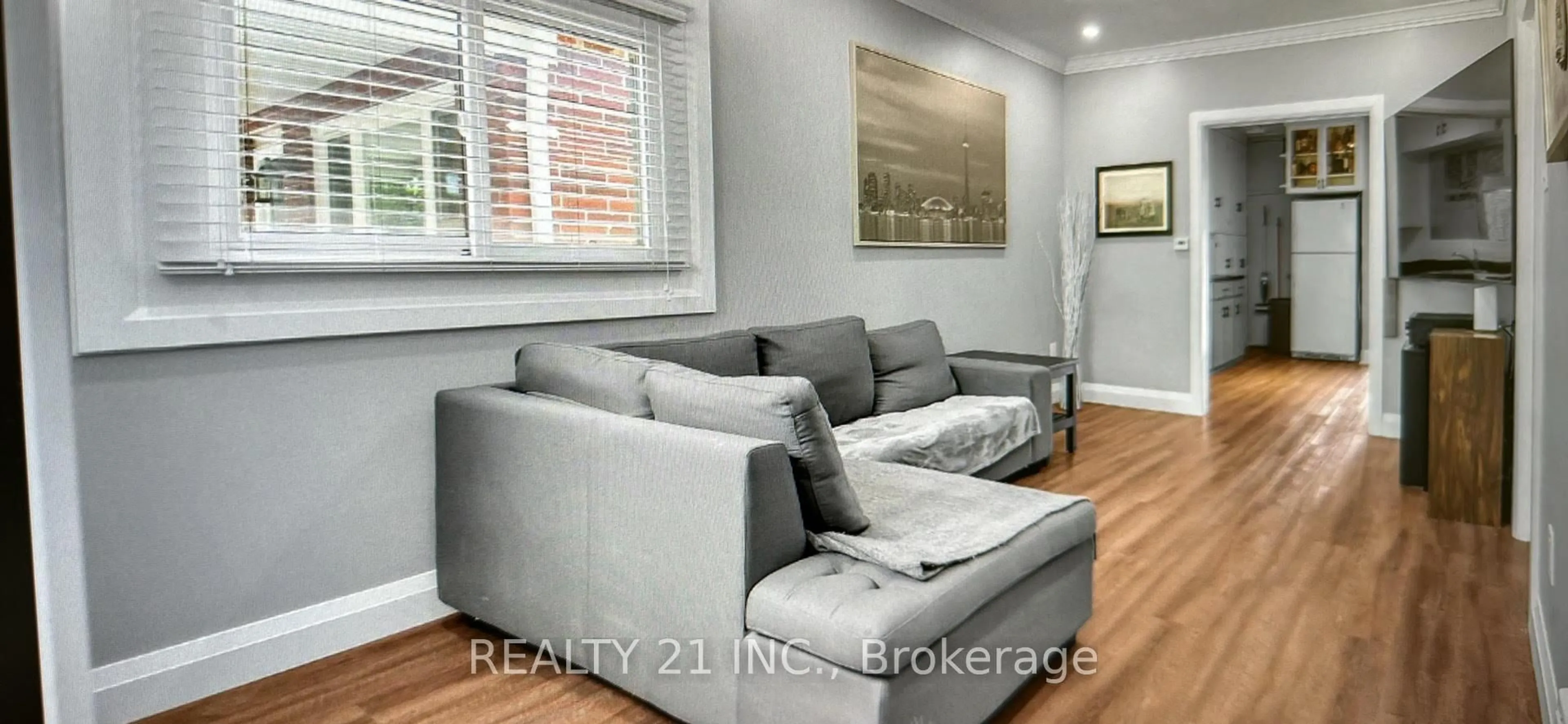 Living room with furniture, wood/laminate floor for 60 Phillip Ave, Toronto Ontario M1N 3R2