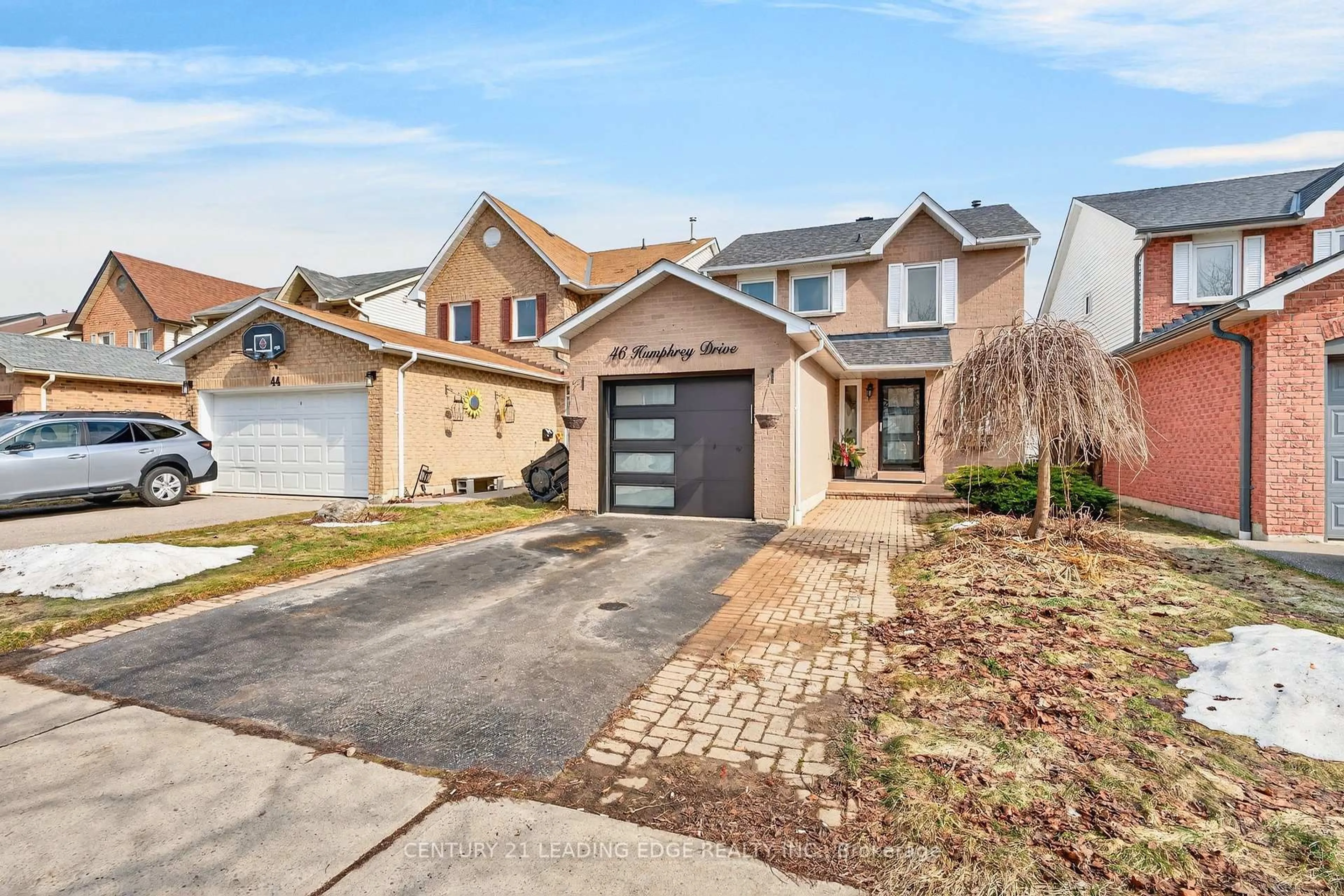 Home with brick exterior material, street for 46 Humphrey Dr, Ajax Ontario L1S 4Z4