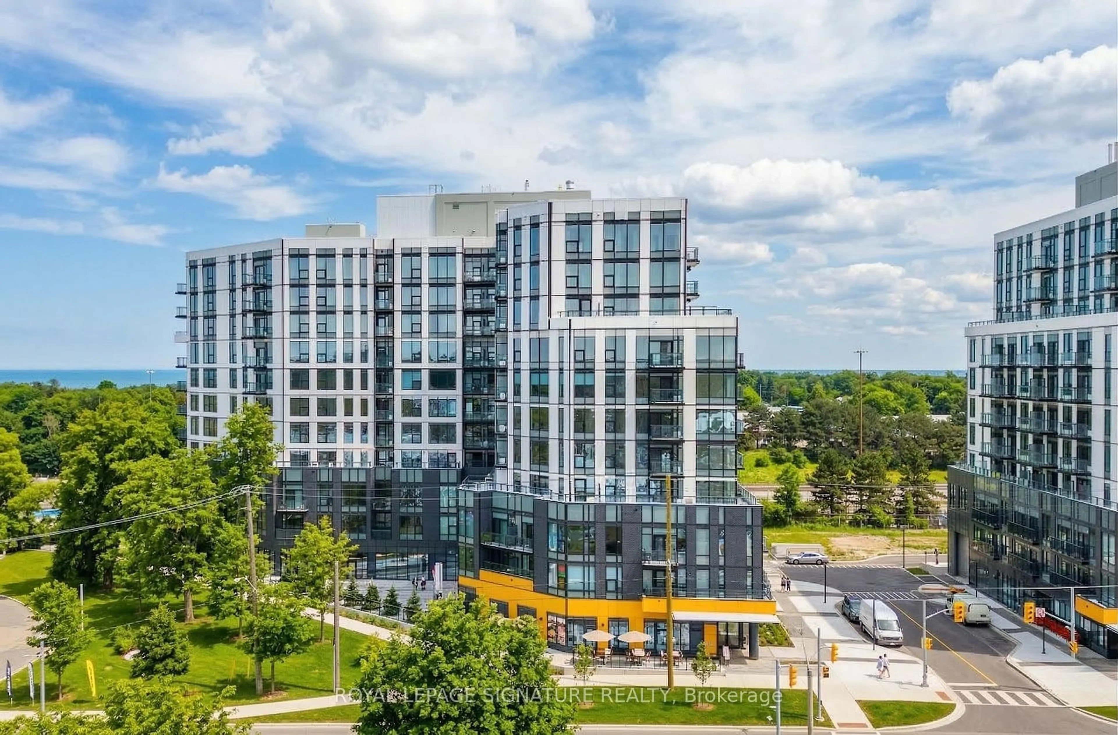 A pic from outside/outdoor area/front of a property/back of a property/a pic from drone, city buildings view from balcony for 7439 Kingston Rd #815, Toronto Ontario M1B 0G1