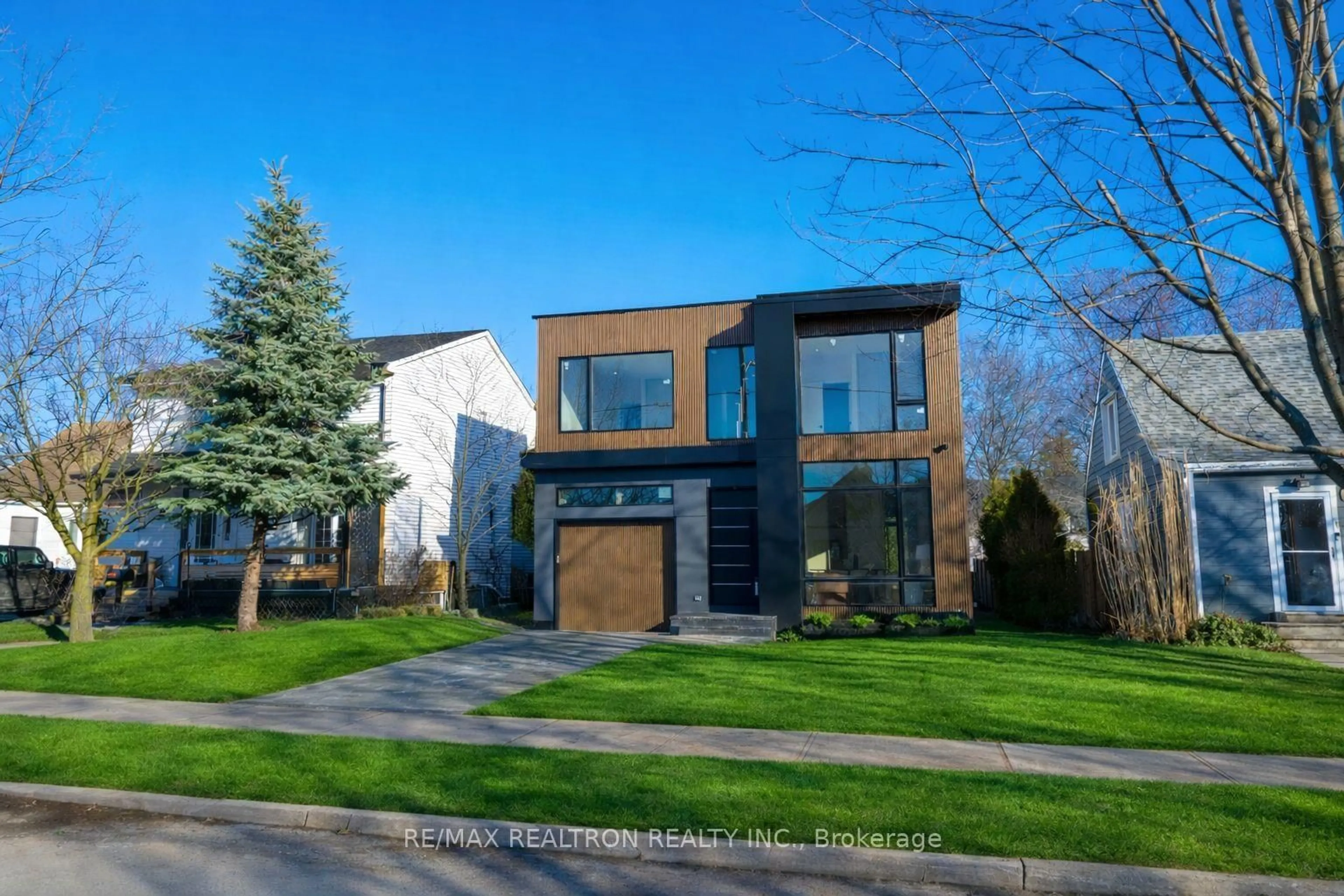 Home with brick exterior material, street for 19 Topham Rd, Toronto Ontario M4B 3K3