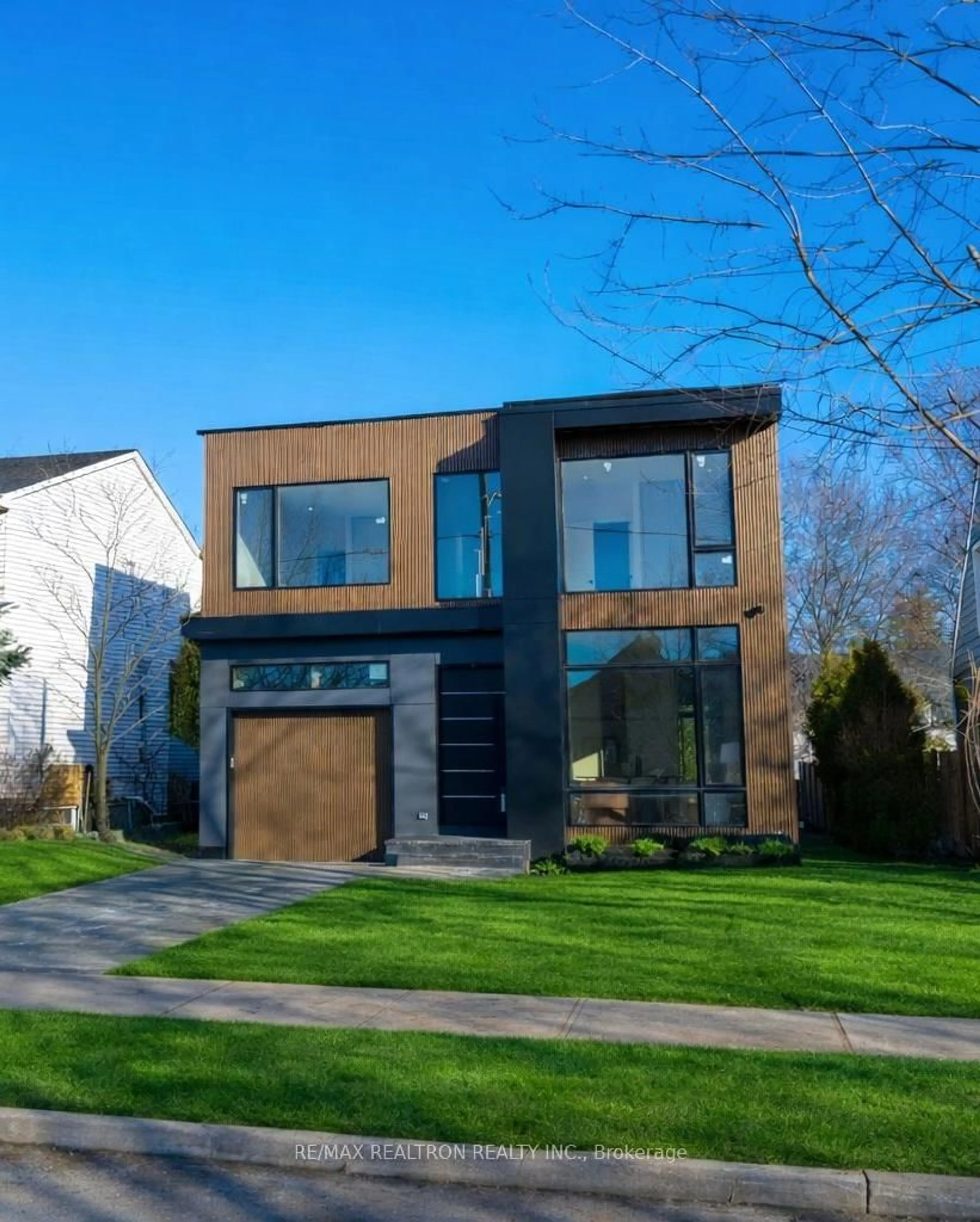 Home with brick exterior material, street for 19 Topham Rd, Toronto Ontario M4B 3K3