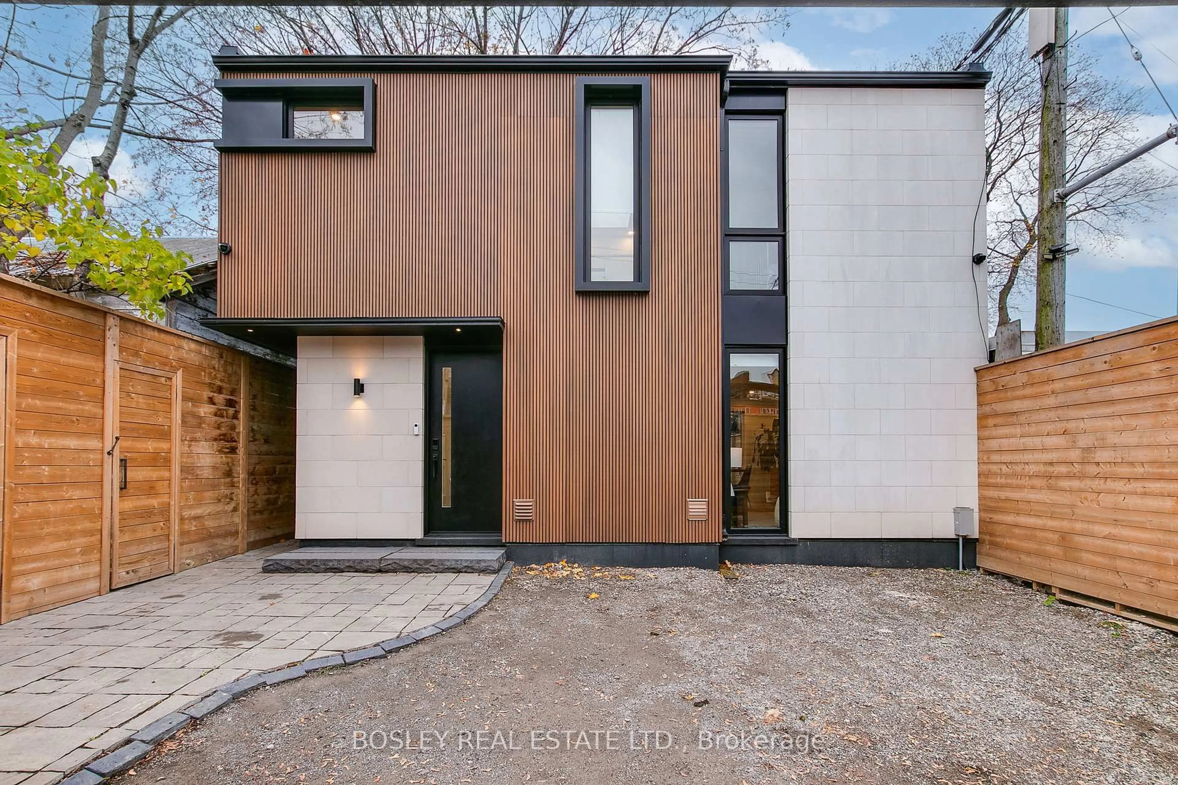 Home with brick exterior material, street for 108 Moberly Ave, Toronto Ontario M4C 4B1