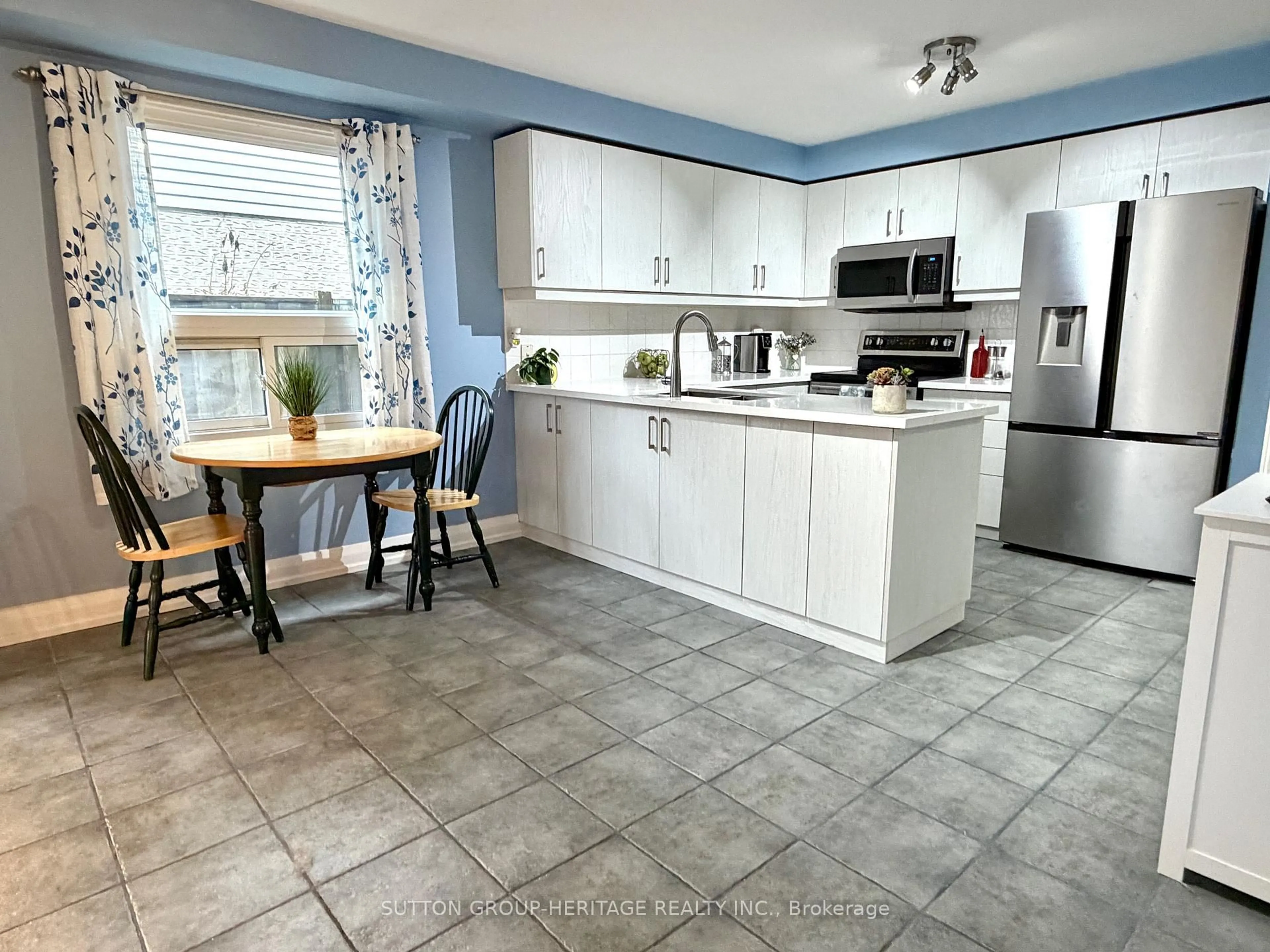 Open concept kitchen, ceramic/tile floor for 52 Barnes Dr, Ajax Ontario L1S 5C6