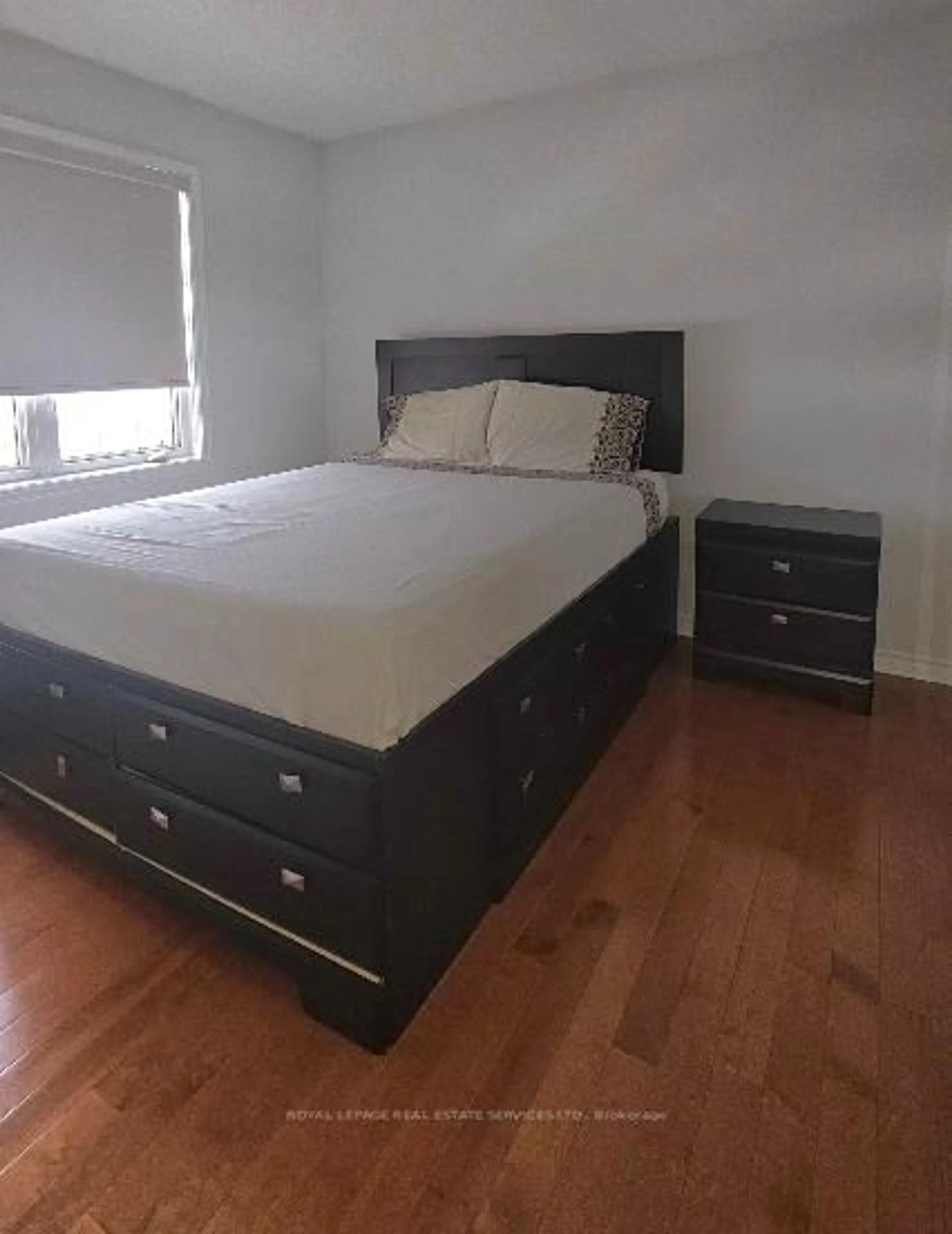 Bedroom with bed, wood/laminate floor for 29 Flycatcher Ave, Toronto Ontario M1X 1Z2