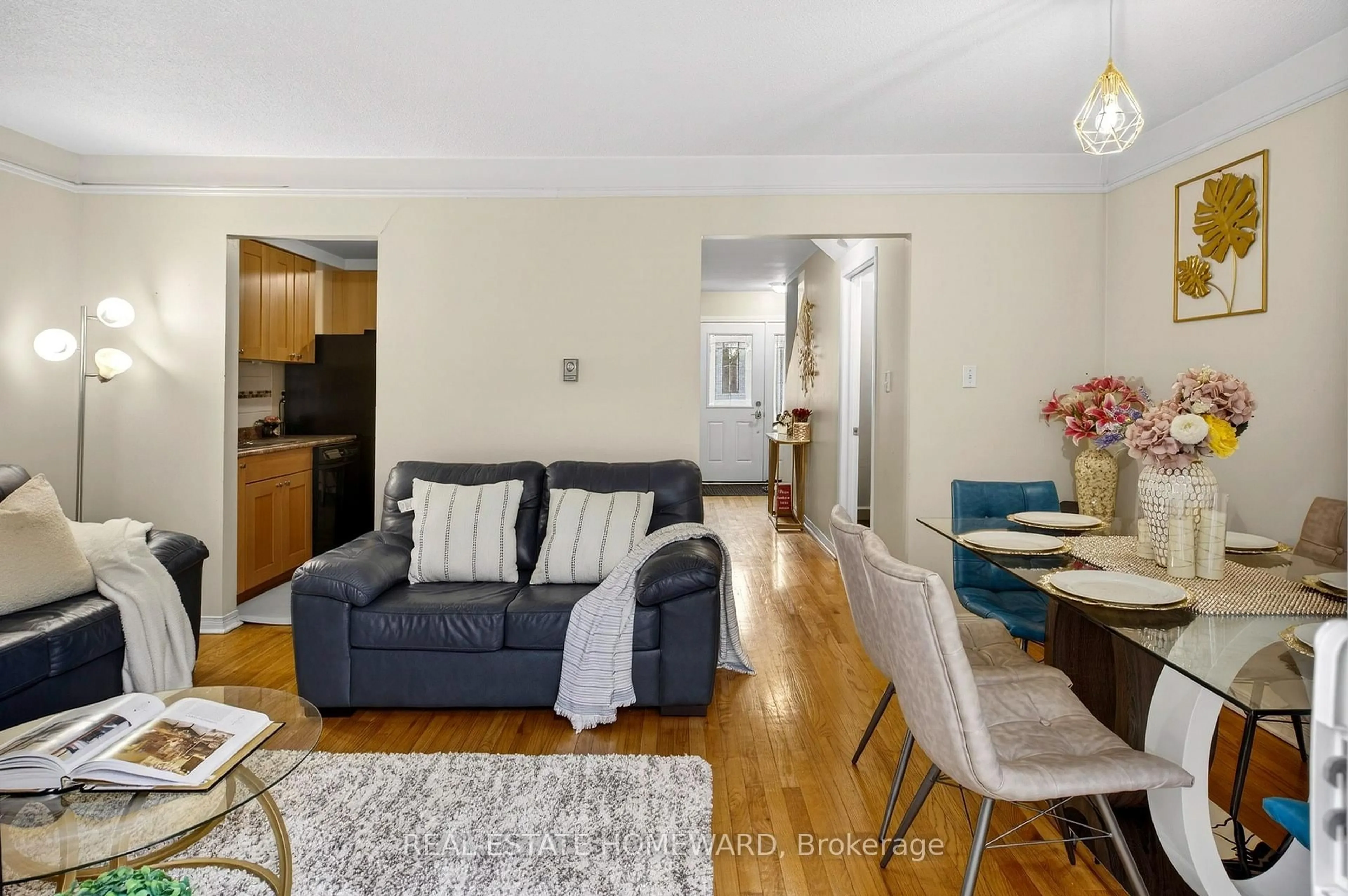 Living room with furniture, wood/laminate floor for 350 Camelot Crt #22, Oshawa Ontario L1G 6P7