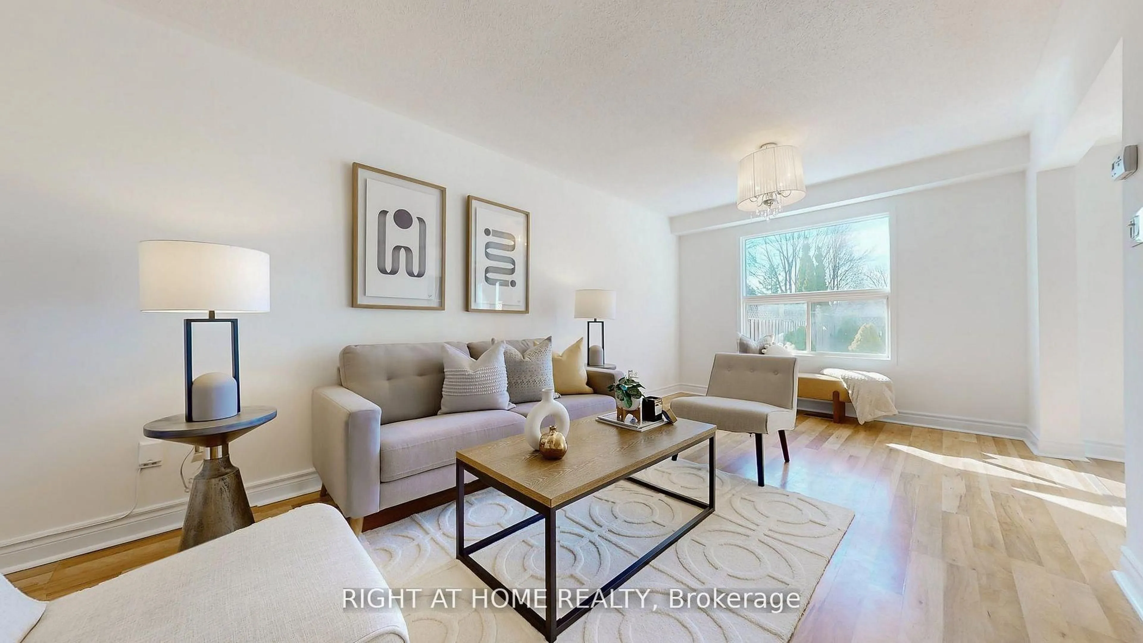 Living room with furniture, wood/laminate floor for 112 Creekwood Cres, Whitby Ontario L1R 2K4