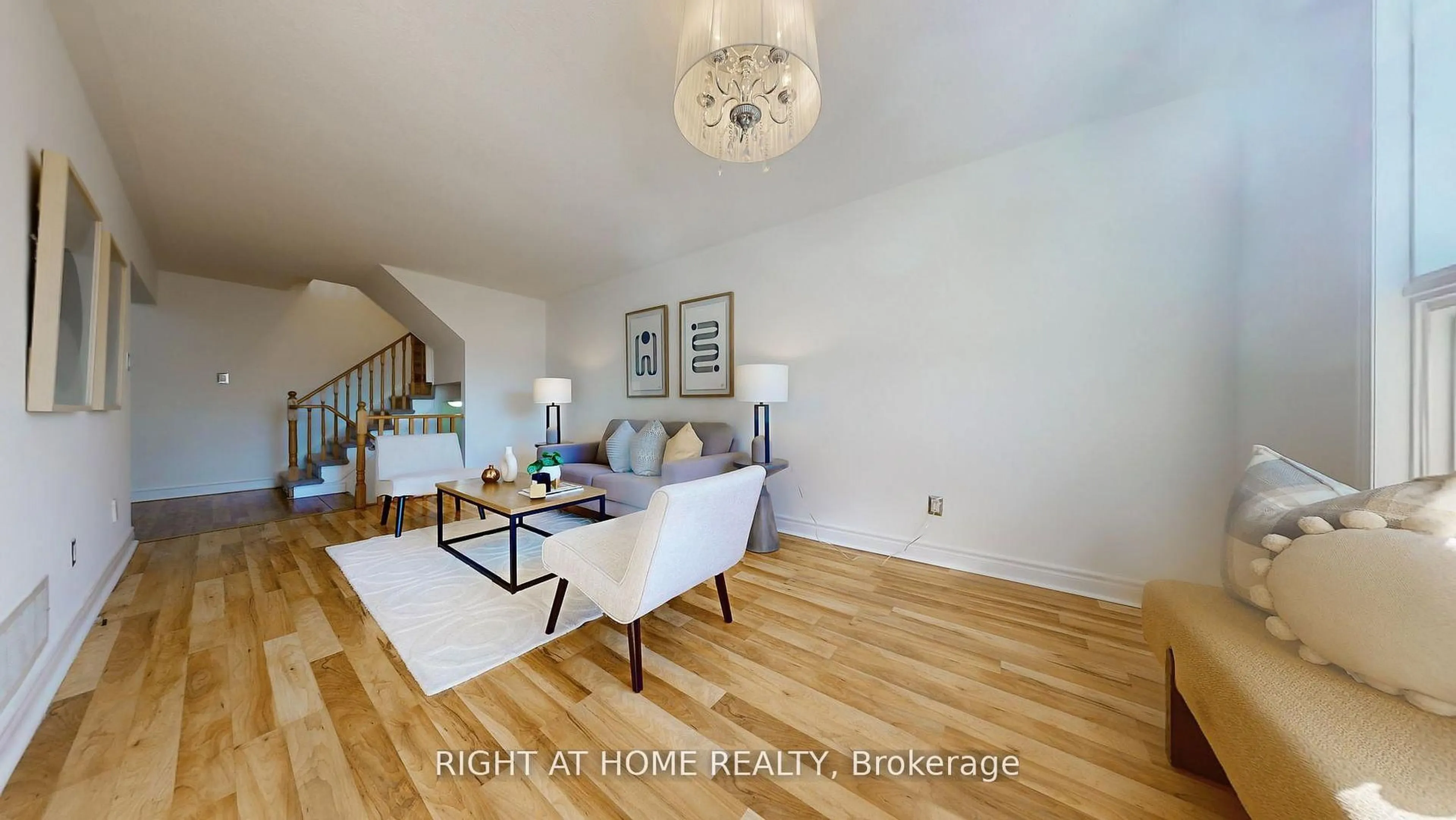 Living room with furniture, wood/laminate floor for 112 Creekwood Cres, Whitby Ontario L1R 2K4