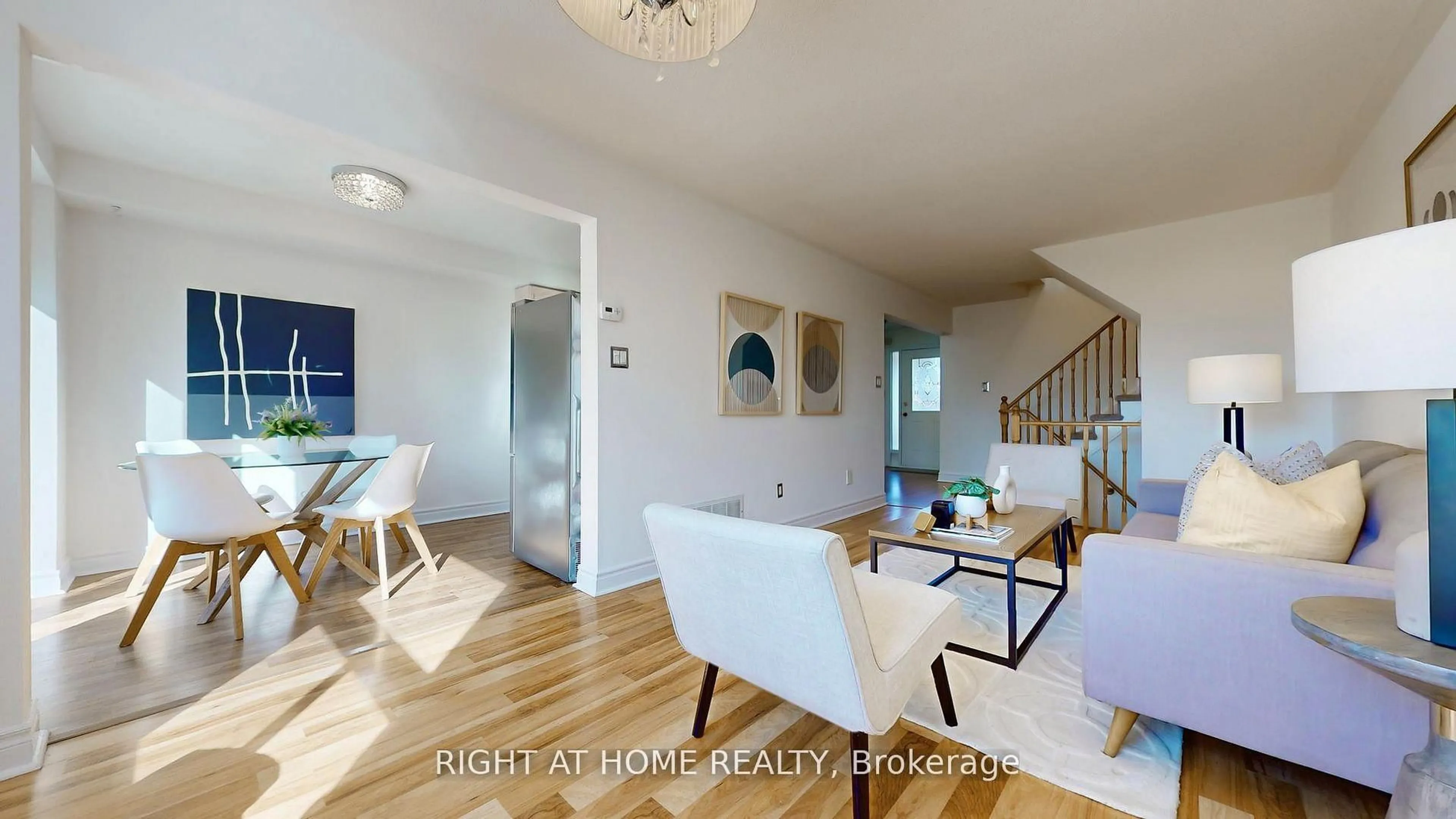 Living room with furniture, wood/laminate floor for 112 Creekwood Cres, Whitby Ontario L1R 2K4