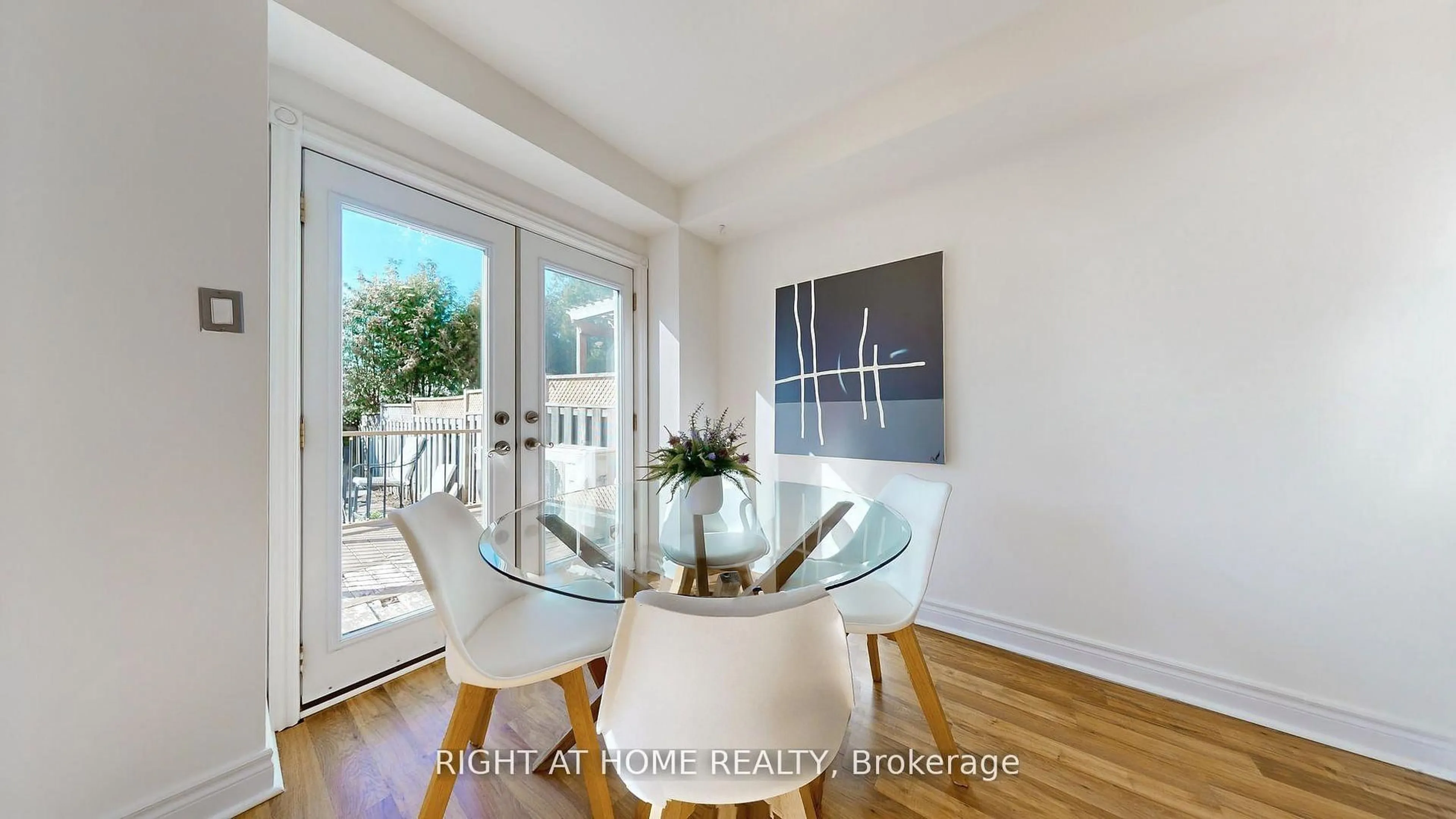 Dining room, wood/laminate floor for 112 Creekwood Cres, Whitby Ontario L1R 2K4