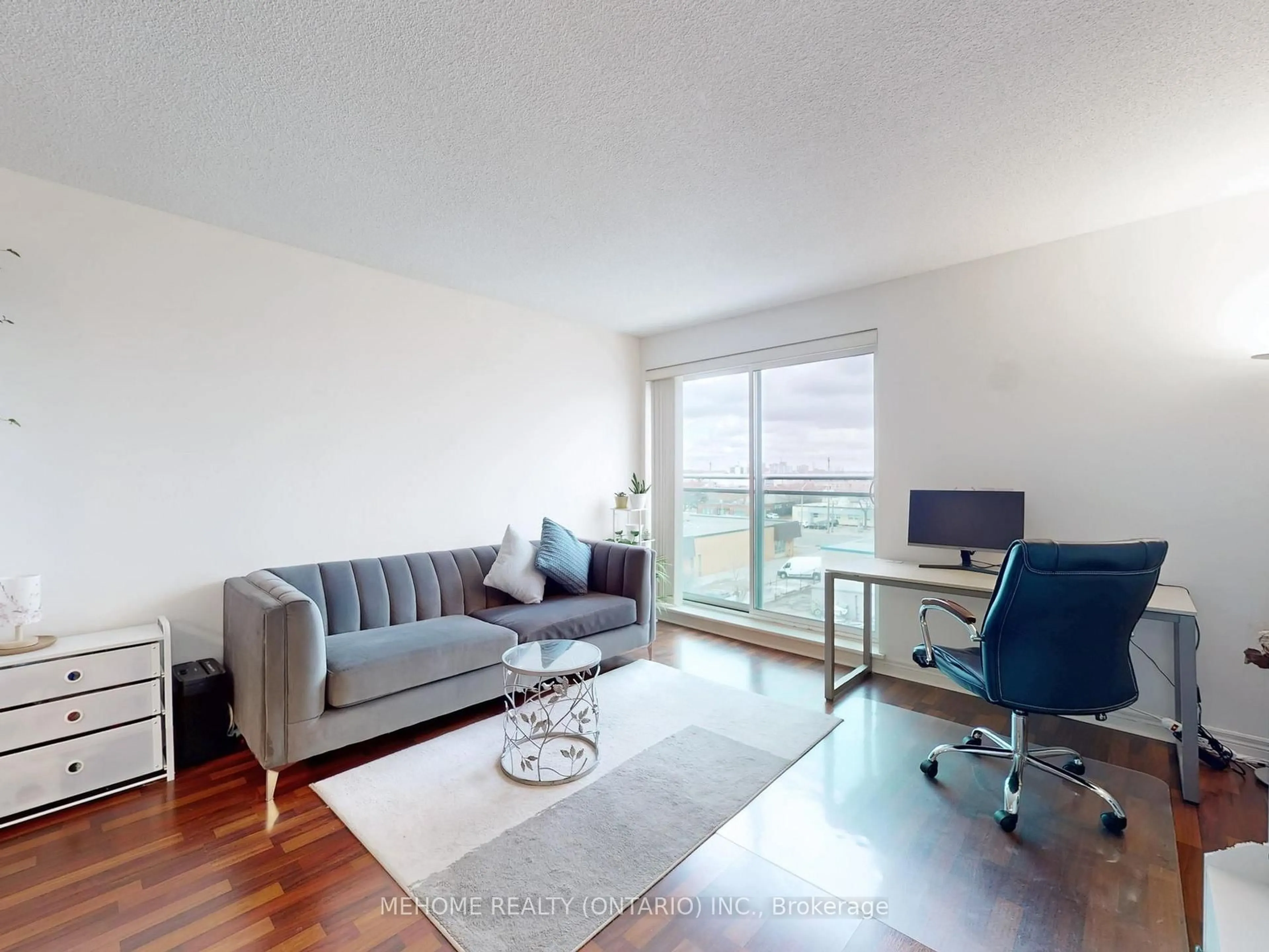 Living room with furniture, wood/laminate floor for 60 Fairfax Cres #531, Toronto Ontario M1L 0E1