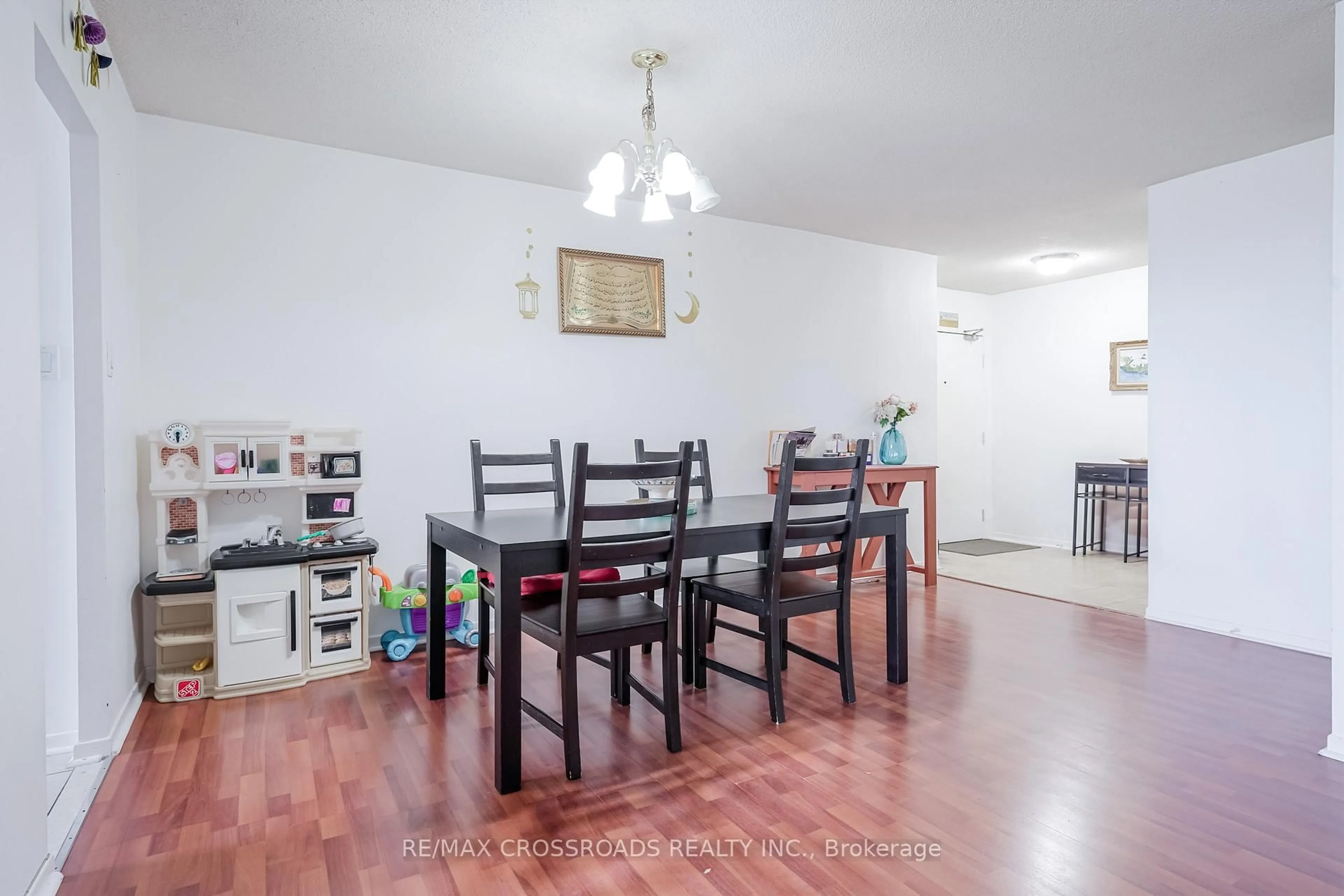 Dining room, wood/laminate floor for 15 Sewells Rd #1204, Toronto Ontario M1B 3V7