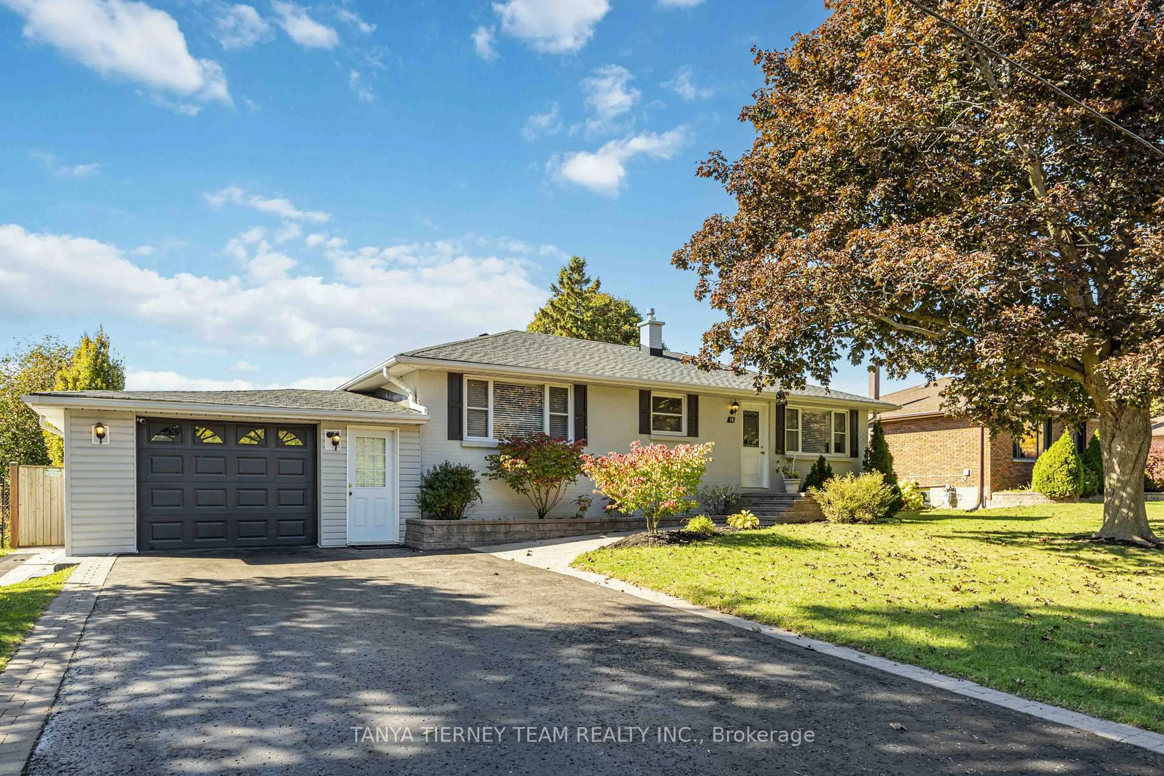 Home with vinyl exterior material, street for 14 Ferguson Ave, Whitby Ontario L1M 1A6