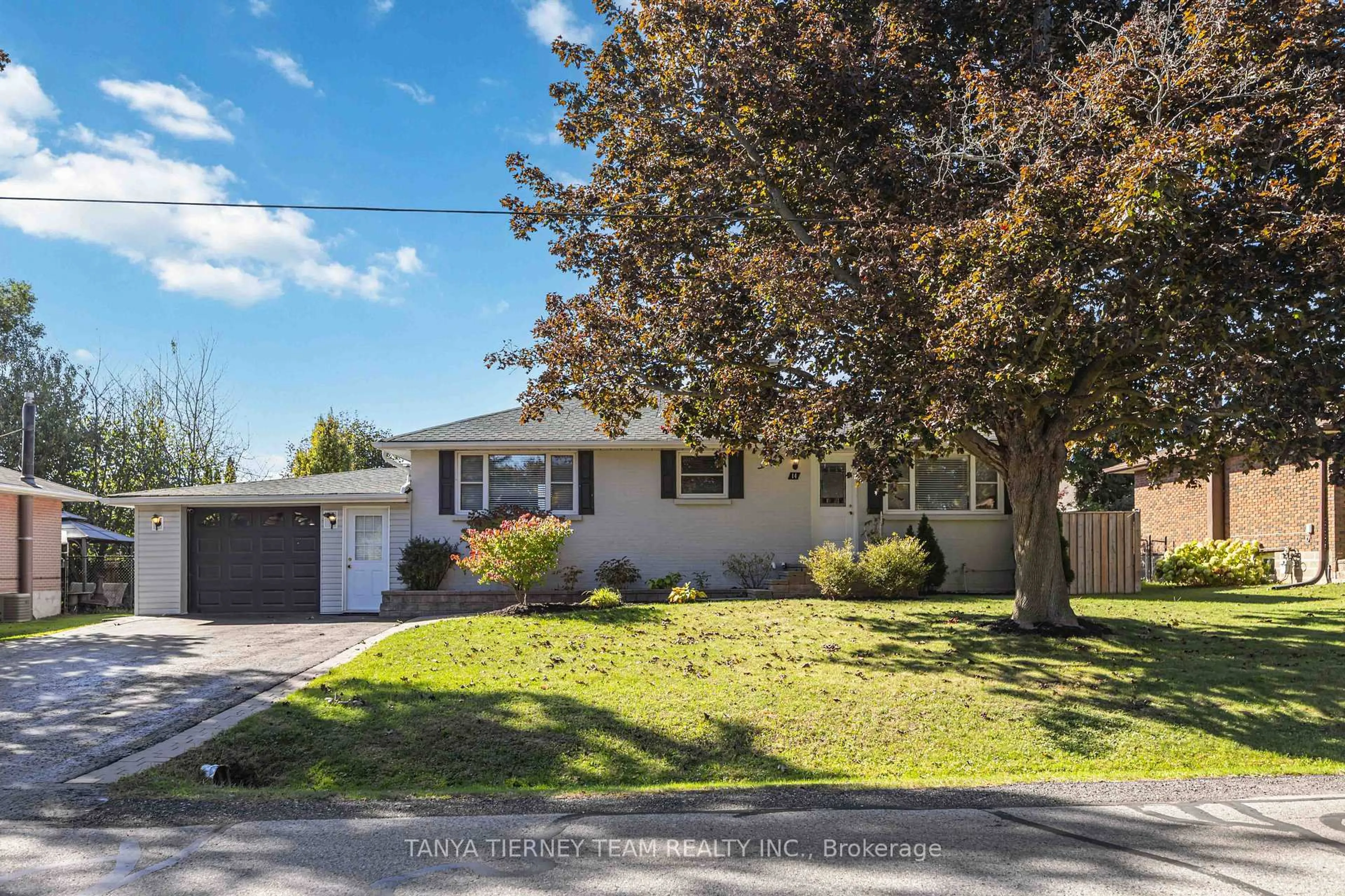 Home with vinyl exterior material, street for 14 Ferguson Ave, Whitby Ontario L1M 1A6