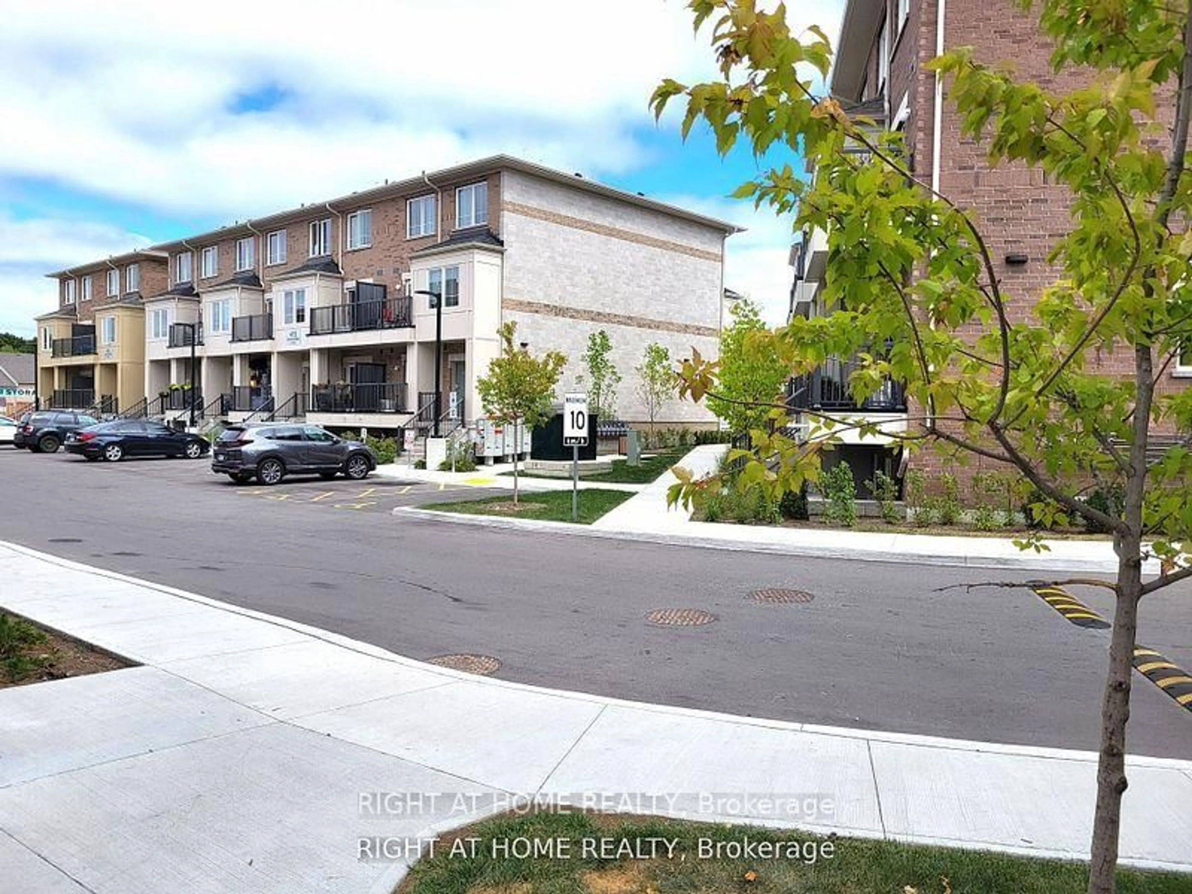 A pic from outside/outdoor area/front of a property/back of a property/a pic from drone, street for 490 Beresford Path #7, Oshawa Ontario L1H 3E1
